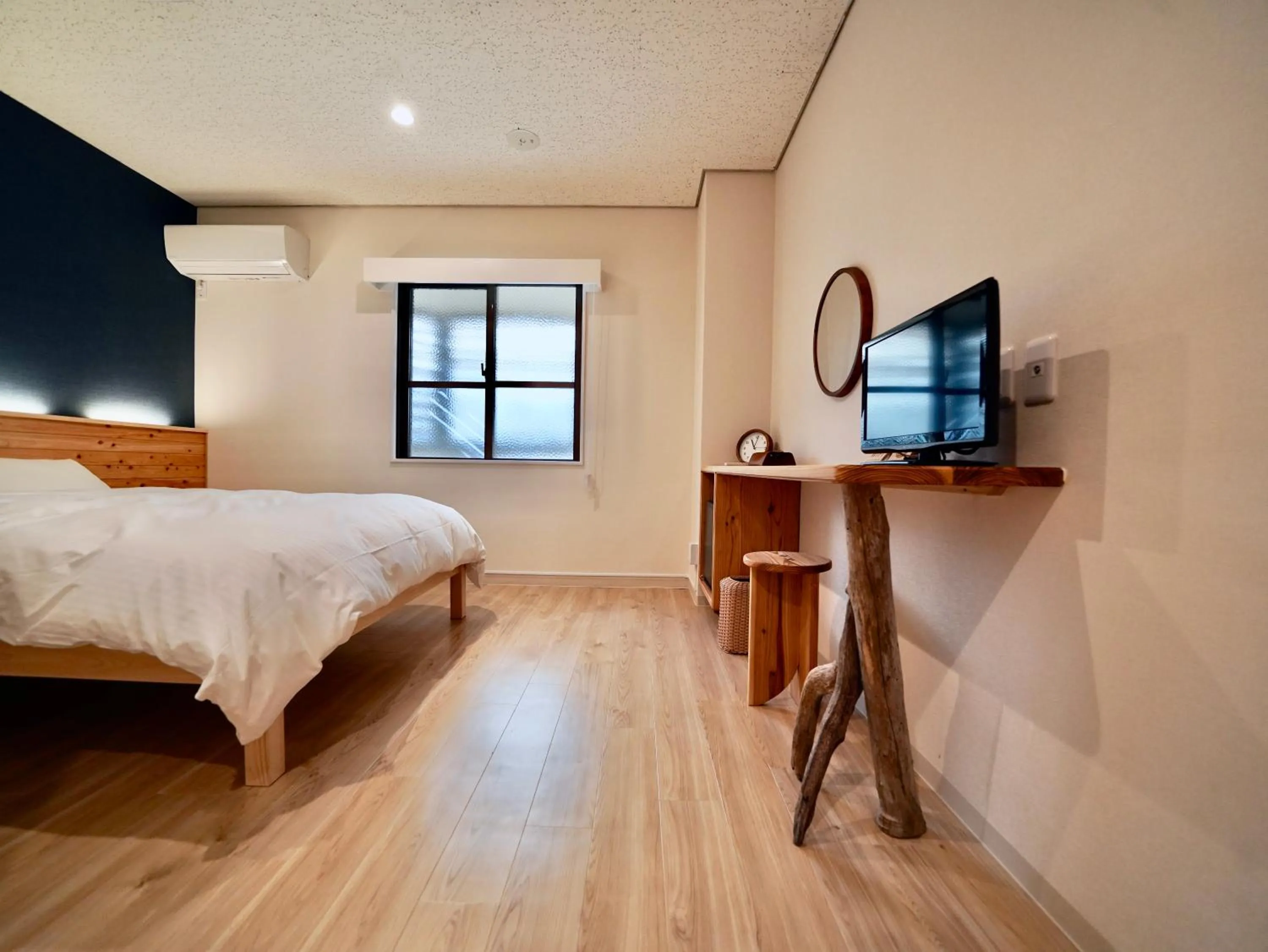 Bed in Hotel Ishigaki and Chikonkiya