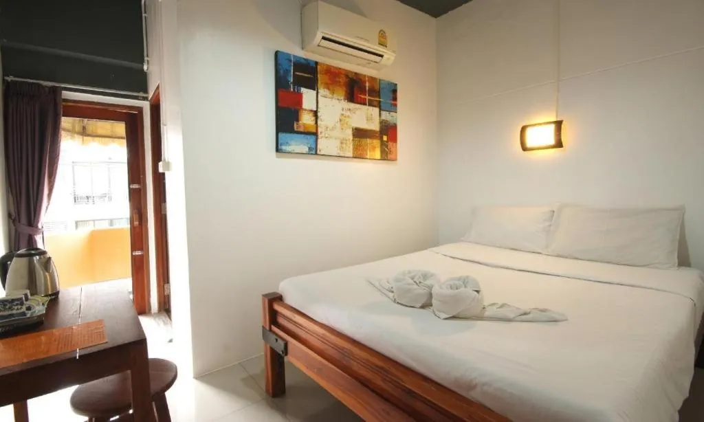 Bed in Hometel Hotel