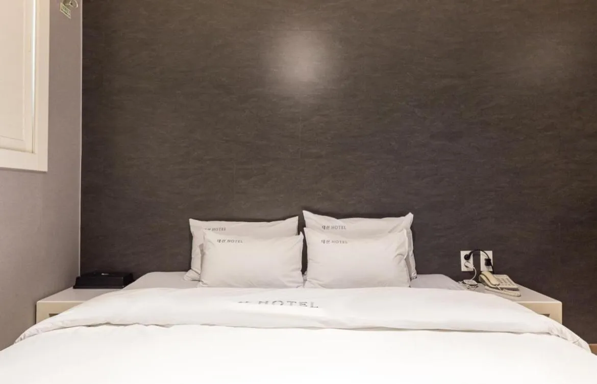 Bed in Daesan Hotel