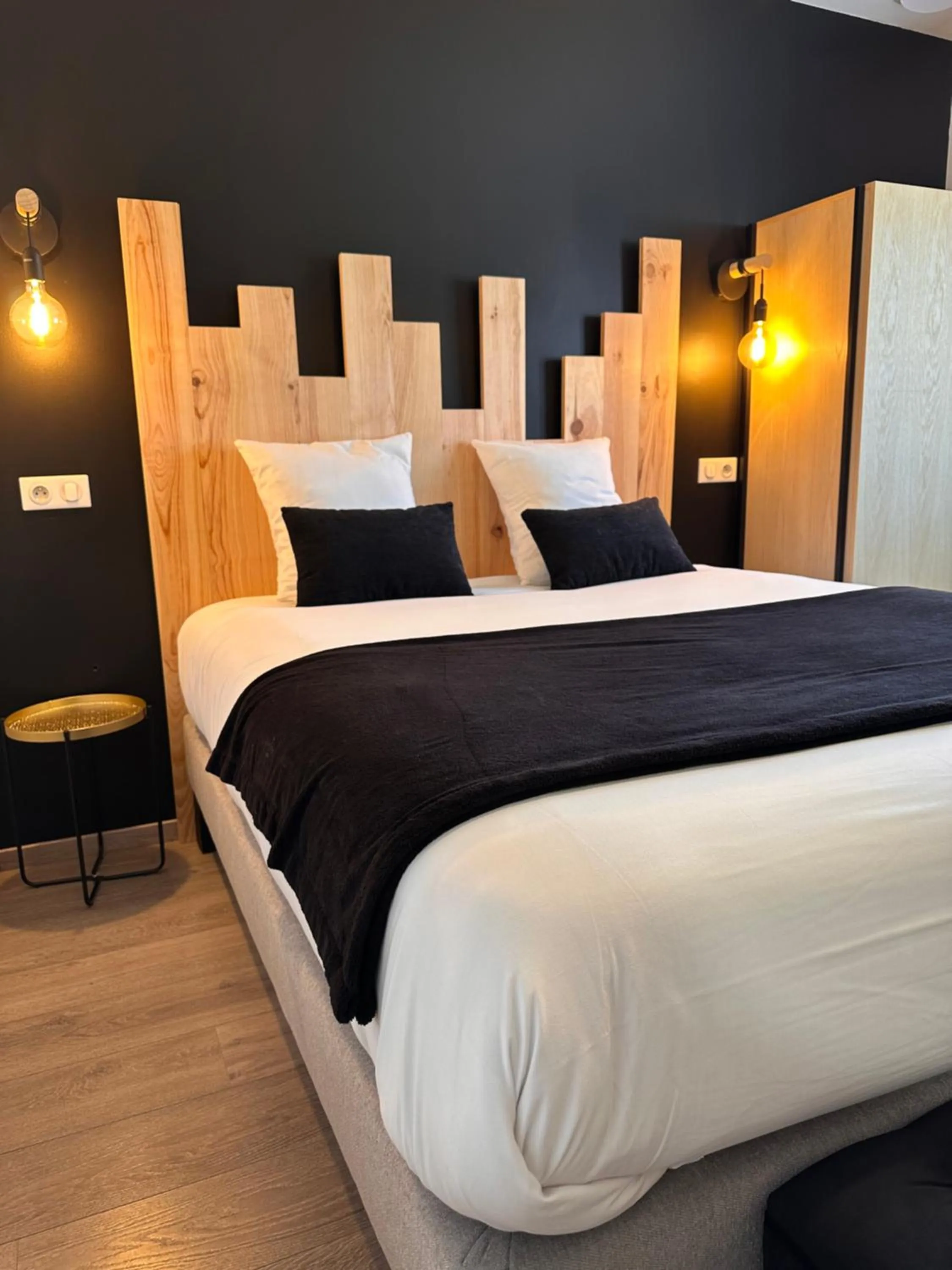 Bed in Auberge du Vieux Lanas Logis Hotel Restaurant