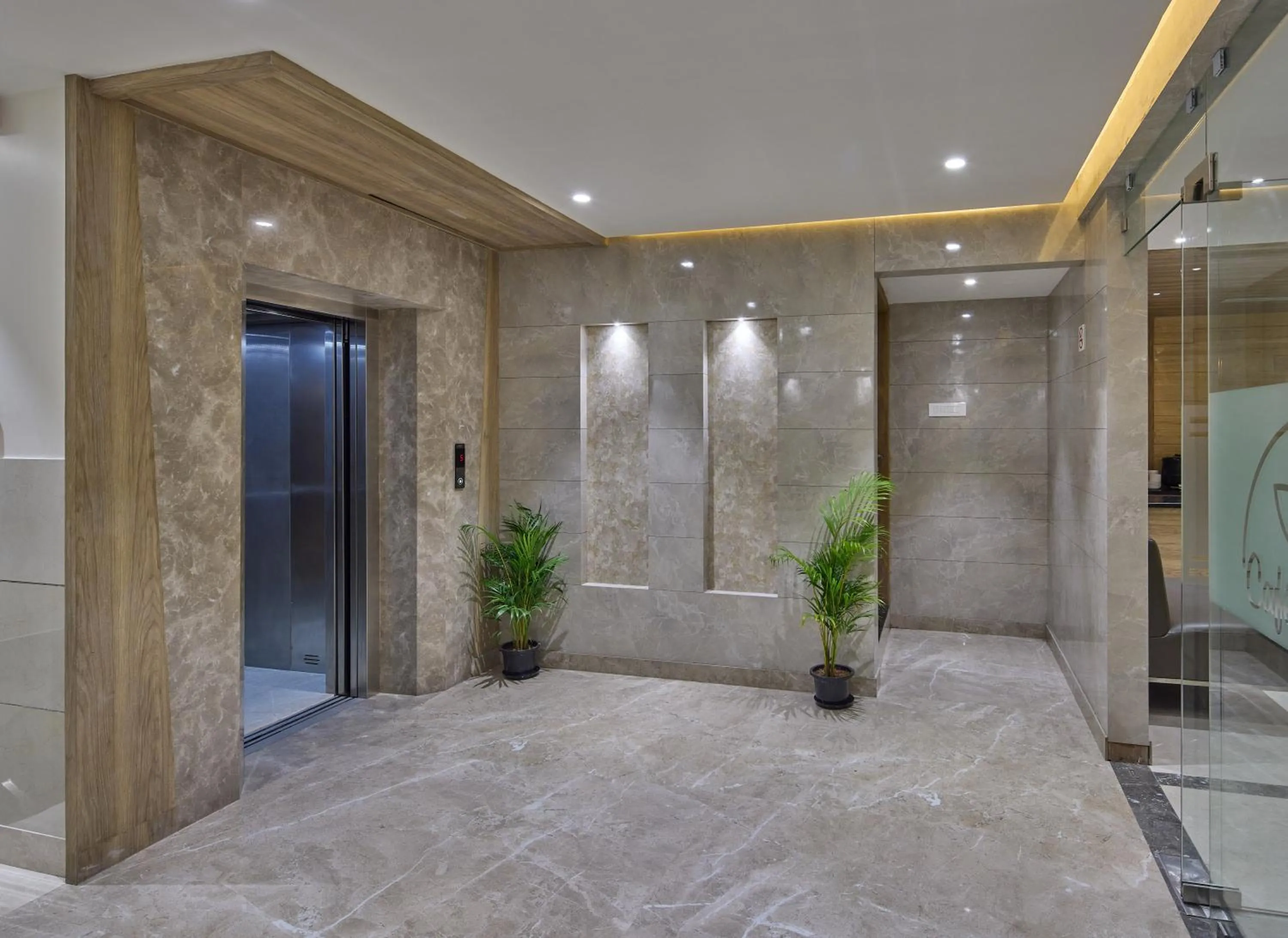 elevator in Grand Continent Hosur A Sarovar Portico Affiliate Hotel