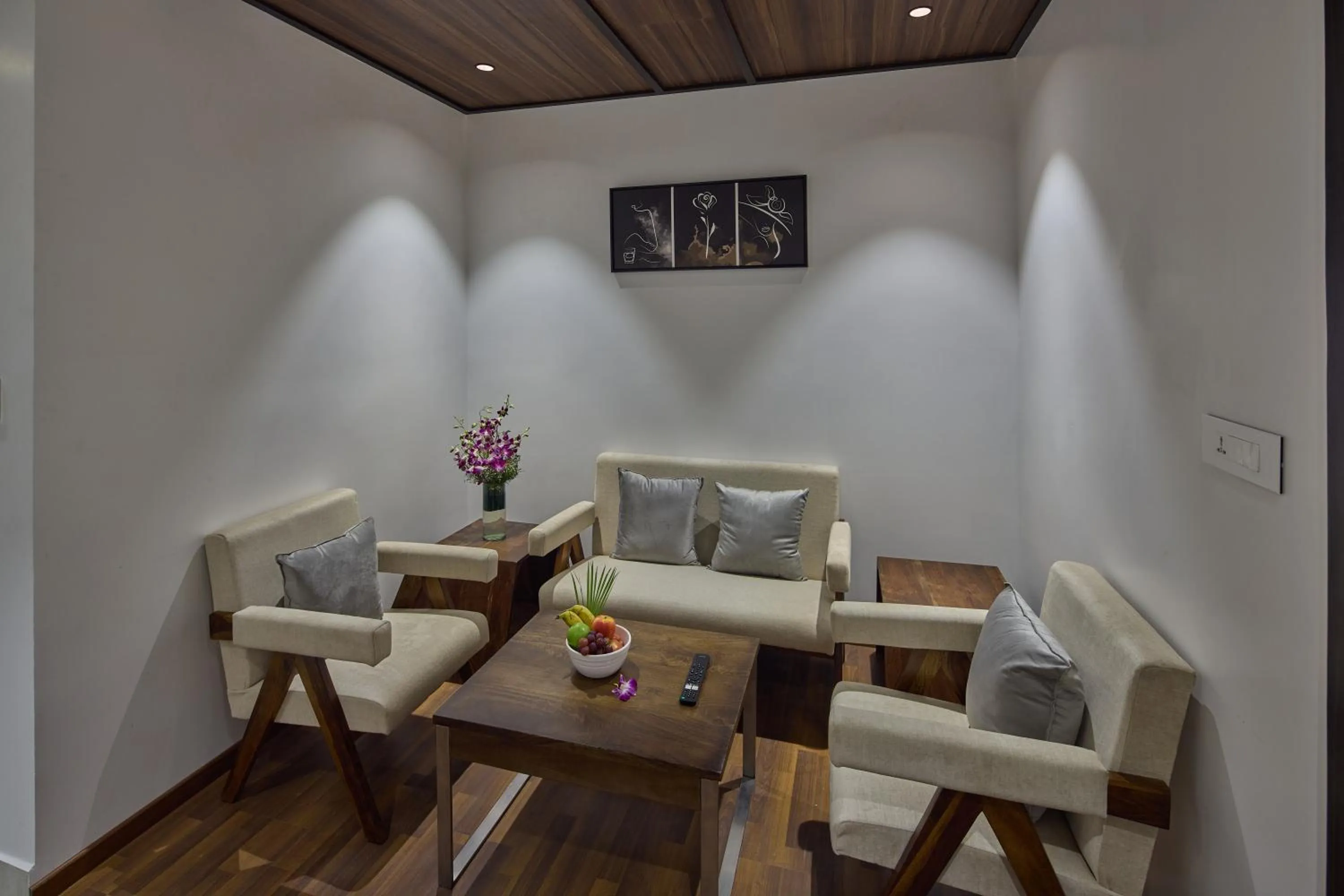 Seating area in Grand Continent Hosur A Sarovar Portico Affiliate Hotel