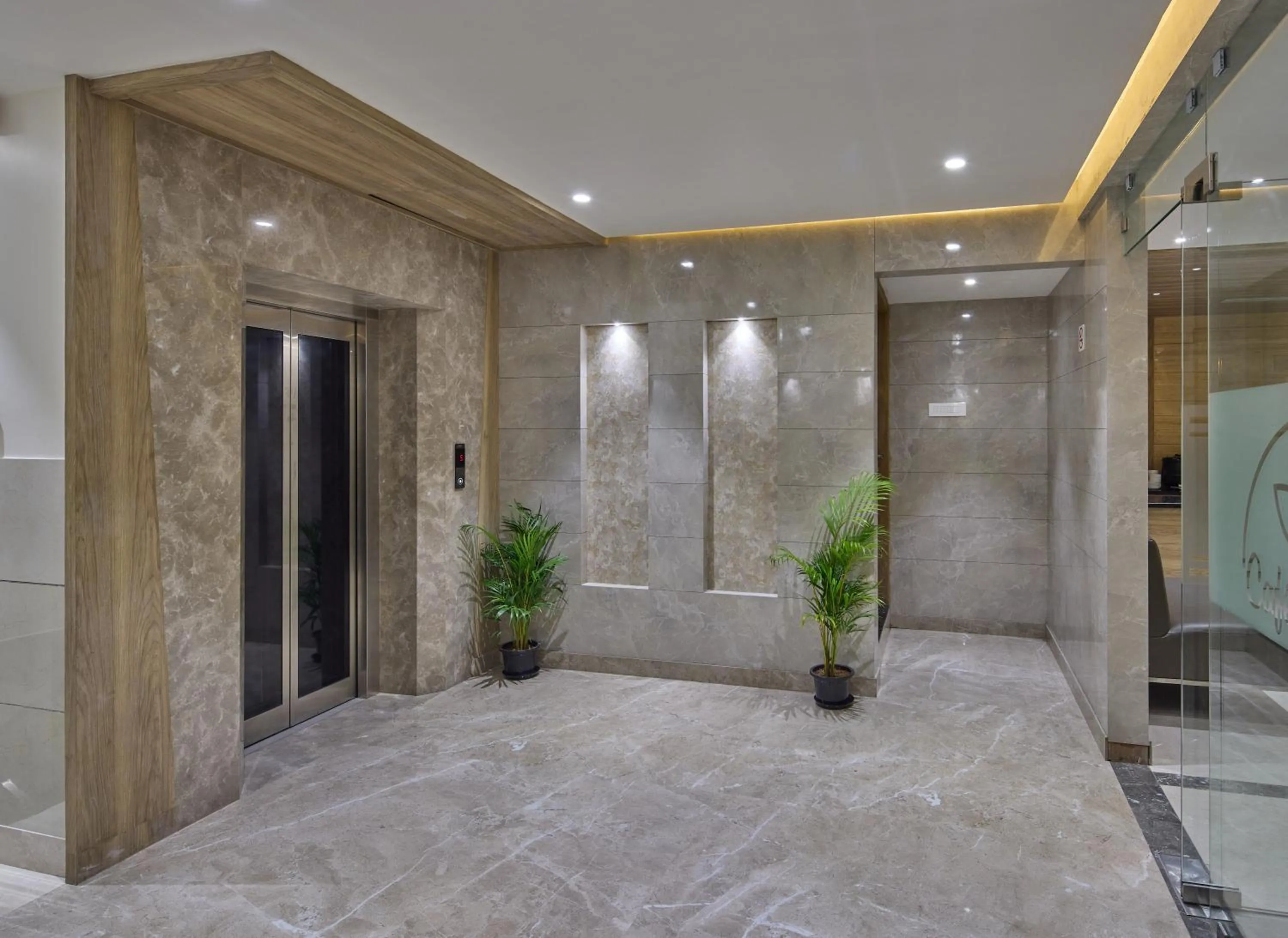 elevator in Grand Continent Hosur A Sarovar Portico Affiliate Hotel