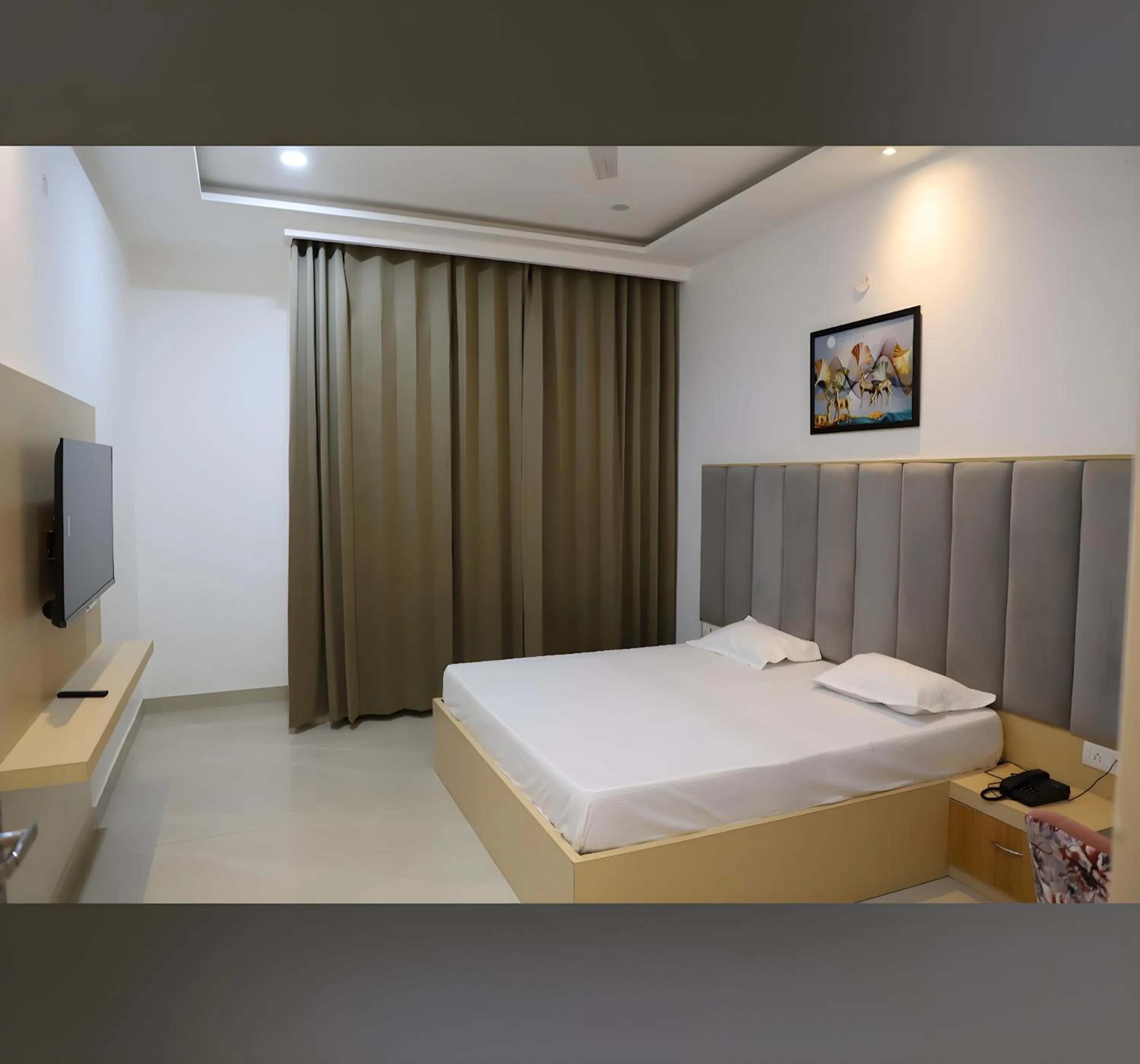 Bed in Radha Madhav Hotel & Banquet