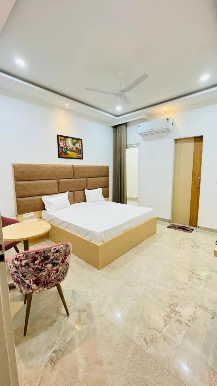 Bed in Radha Madhav Hotel & Banquet