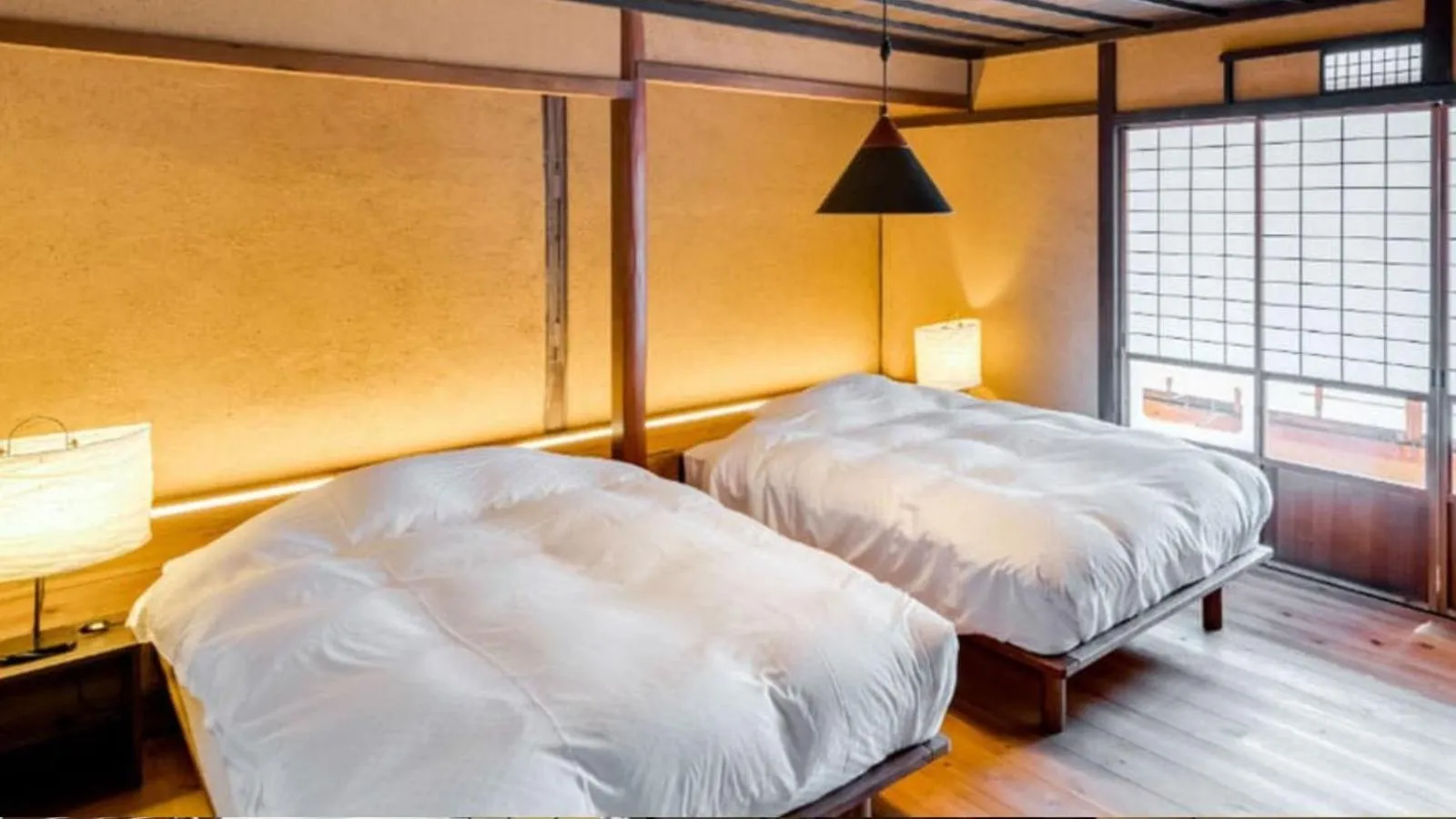 Bed in EN Takeda Castle Town Hotel