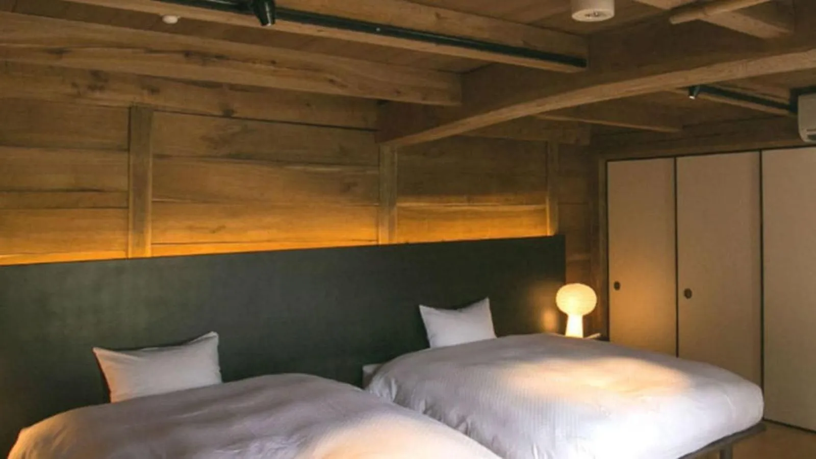 Bed in EN Takeda Castle Town Hotel