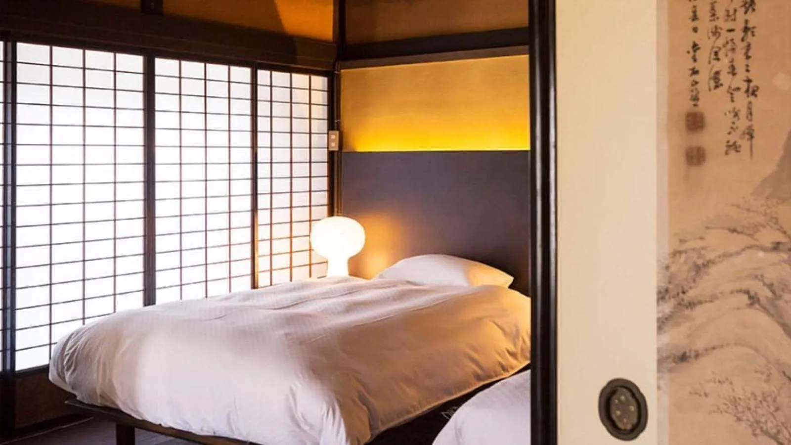 Bed in EN Takeda Castle Town Hotel