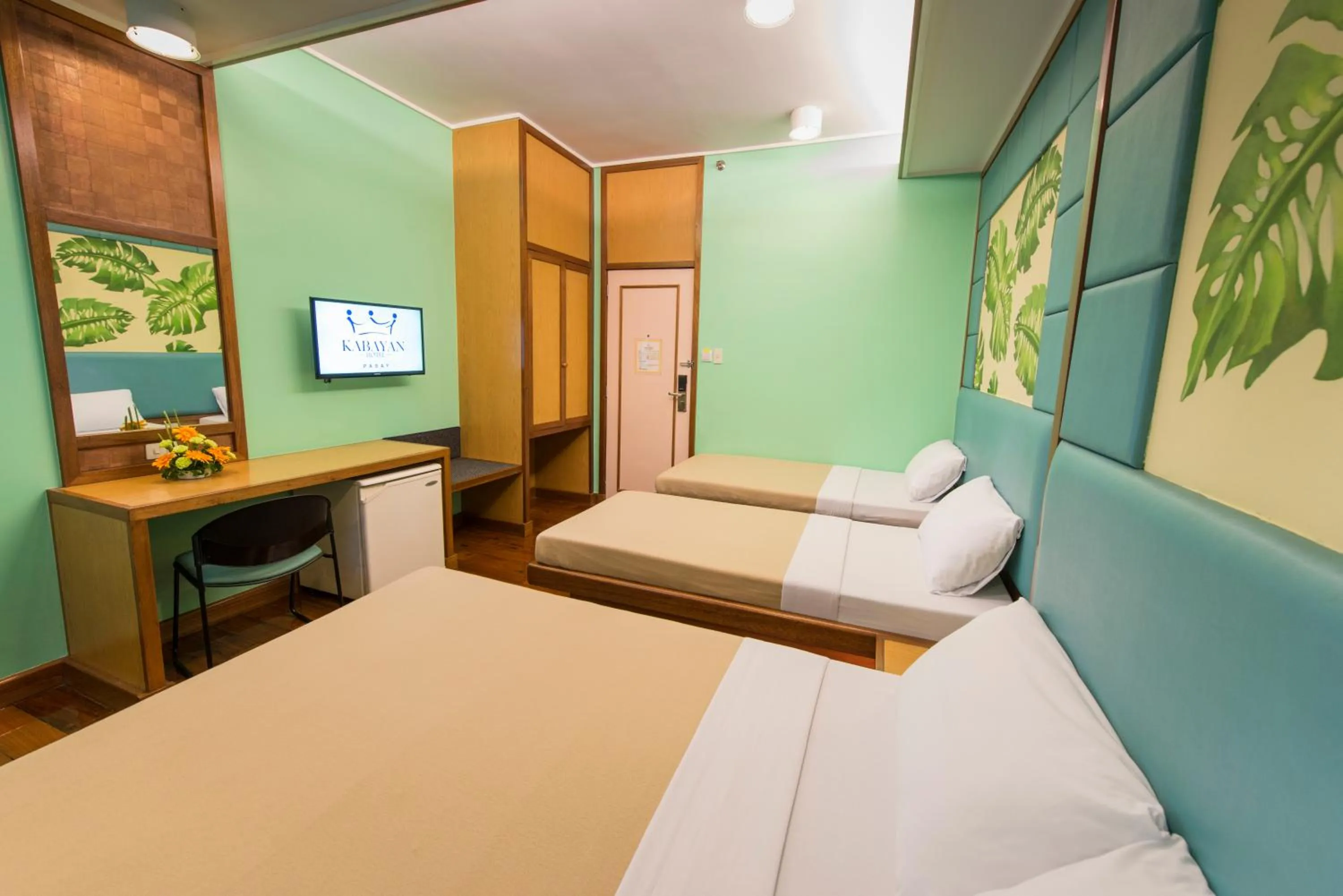 Photo of the whole room, Bed in Kabayan Hotel Pasay