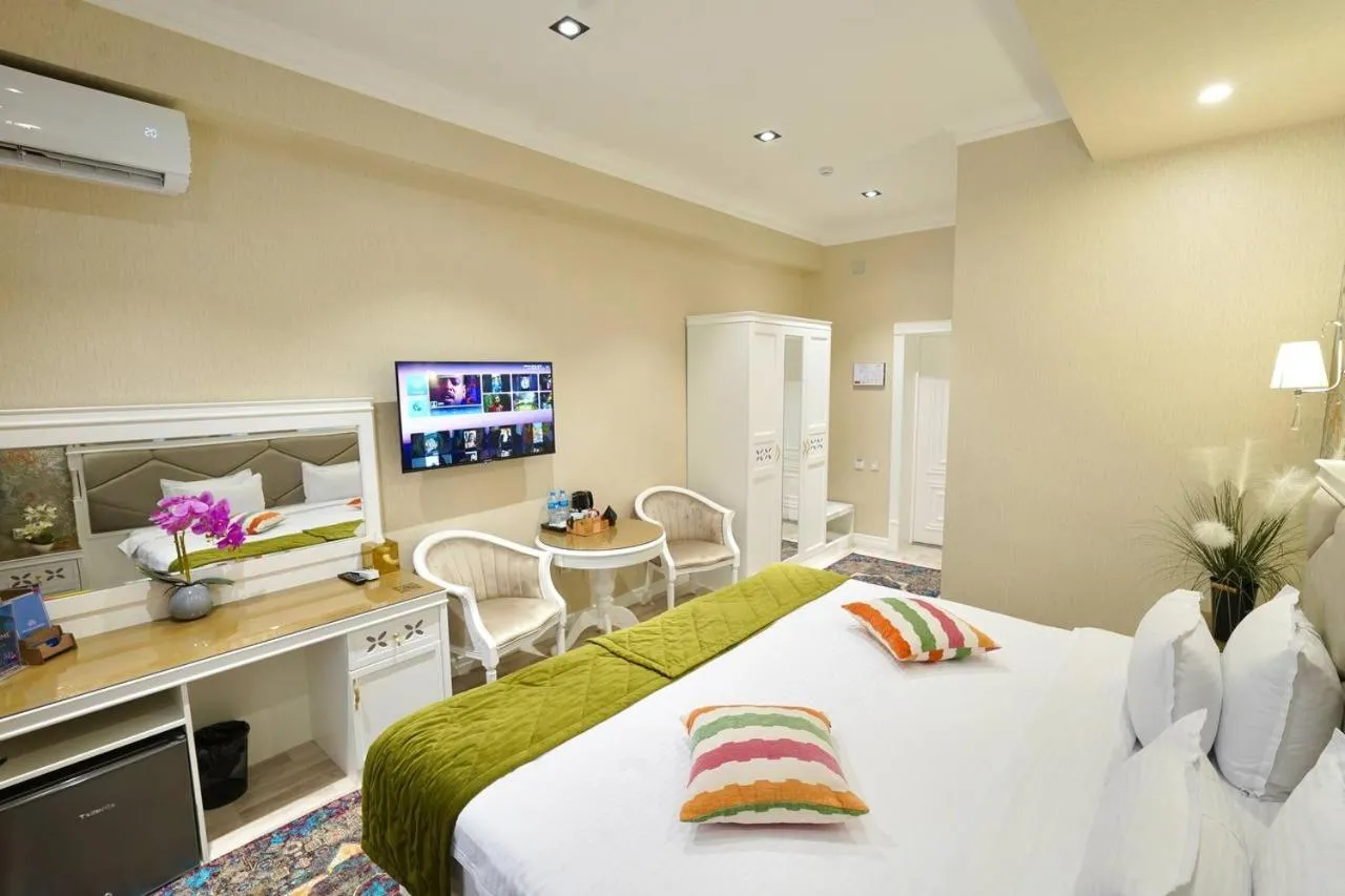 Bed in HOTEL SILK ROAD EMPIRE SAMARKAND