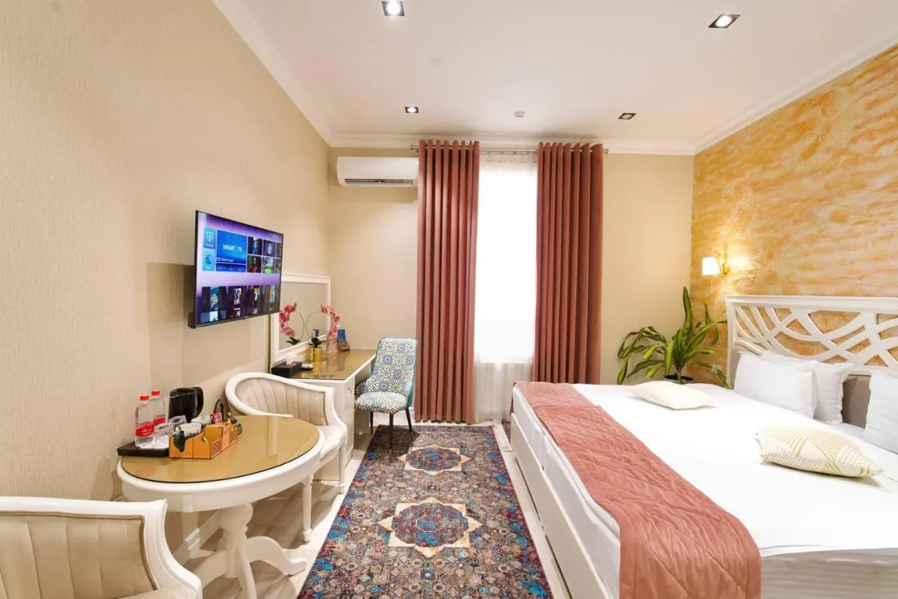 Bed in HOTEL SILK ROAD EMPIRE SAMARKAND