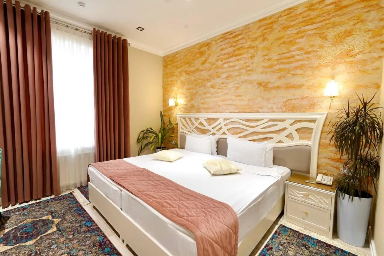 Bed in HOTEL SILK ROAD EMPIRE SAMARKAND