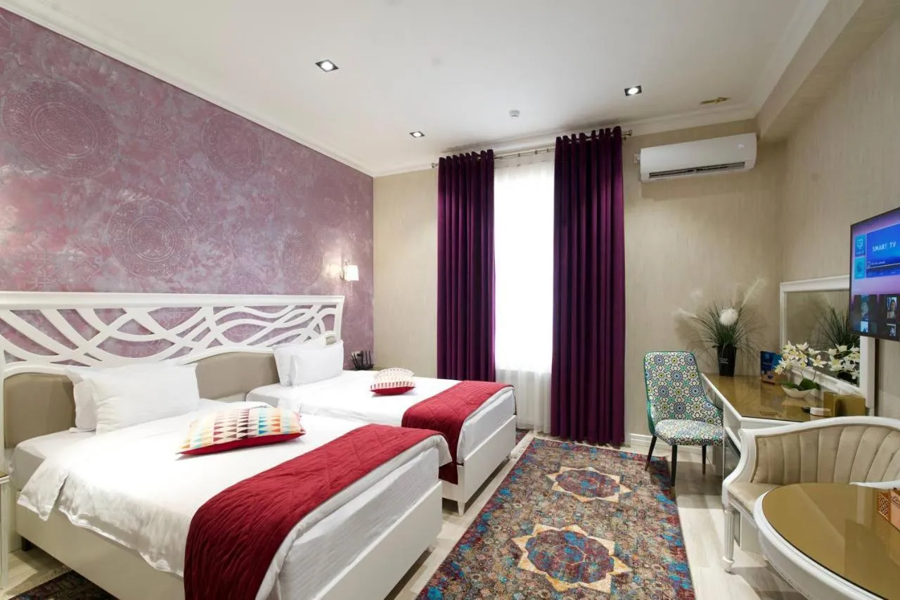 Bed in HOTEL SILK ROAD EMPIRE SAMARKAND