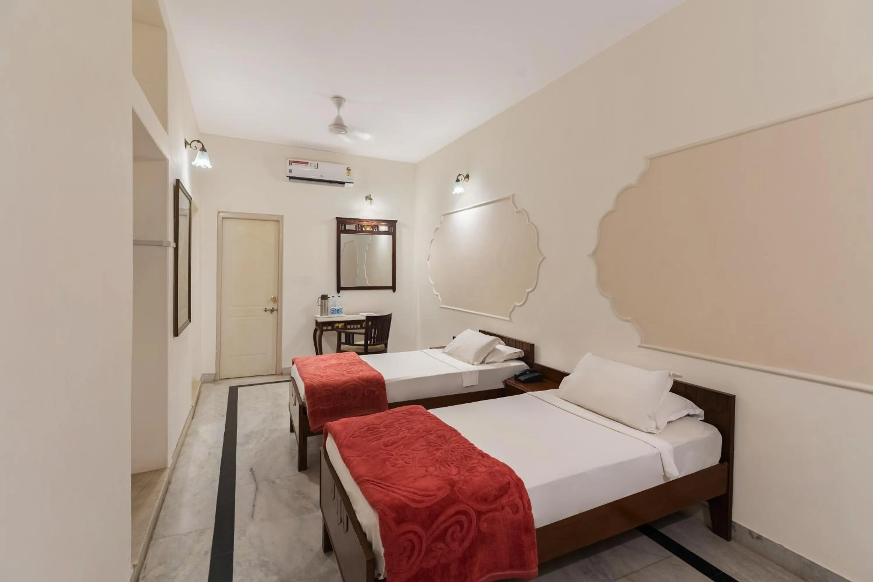 Bed in WelcomHeritage Kalyan Bhawan Hotel