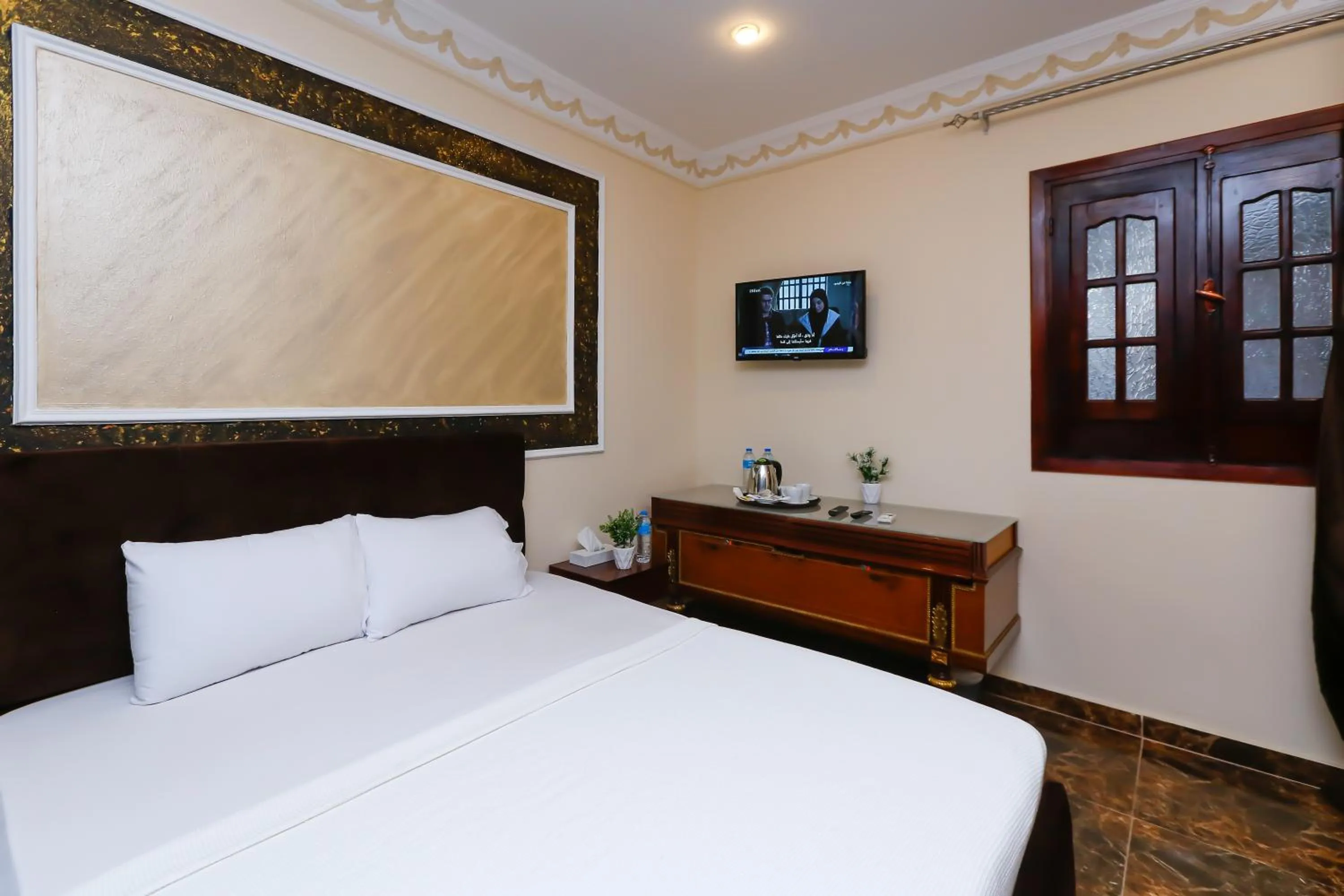 Bed in Turquoise Pyramids palace