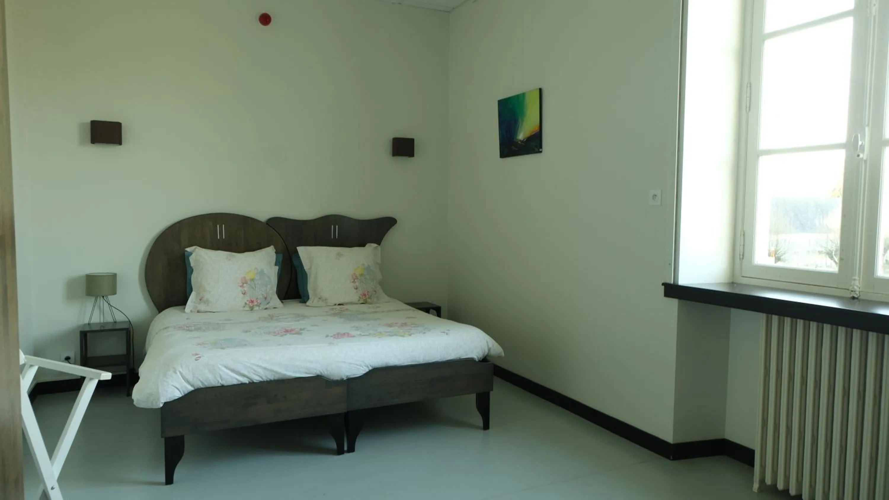 Bed in Château de Briançon, The Originals Relais