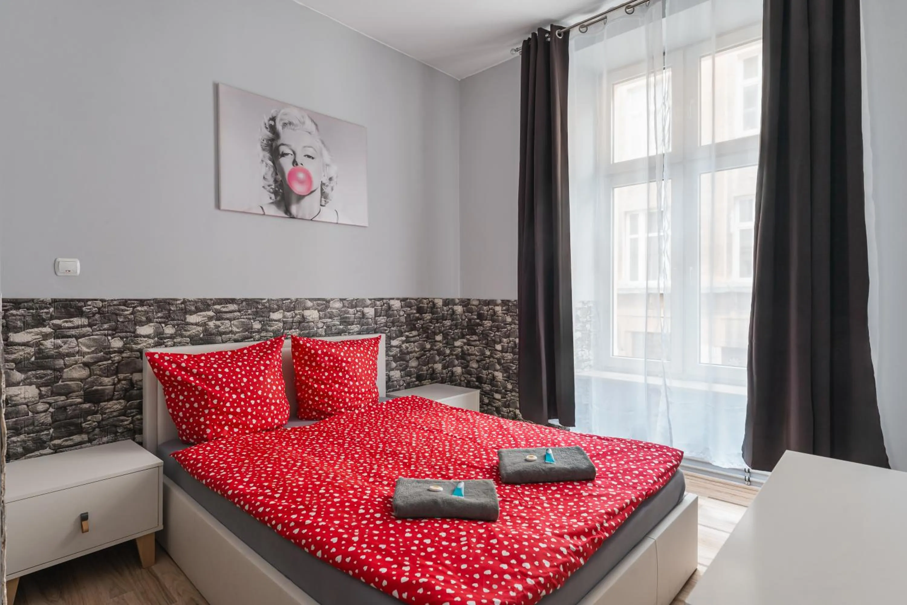 Bed in Queen Apartments