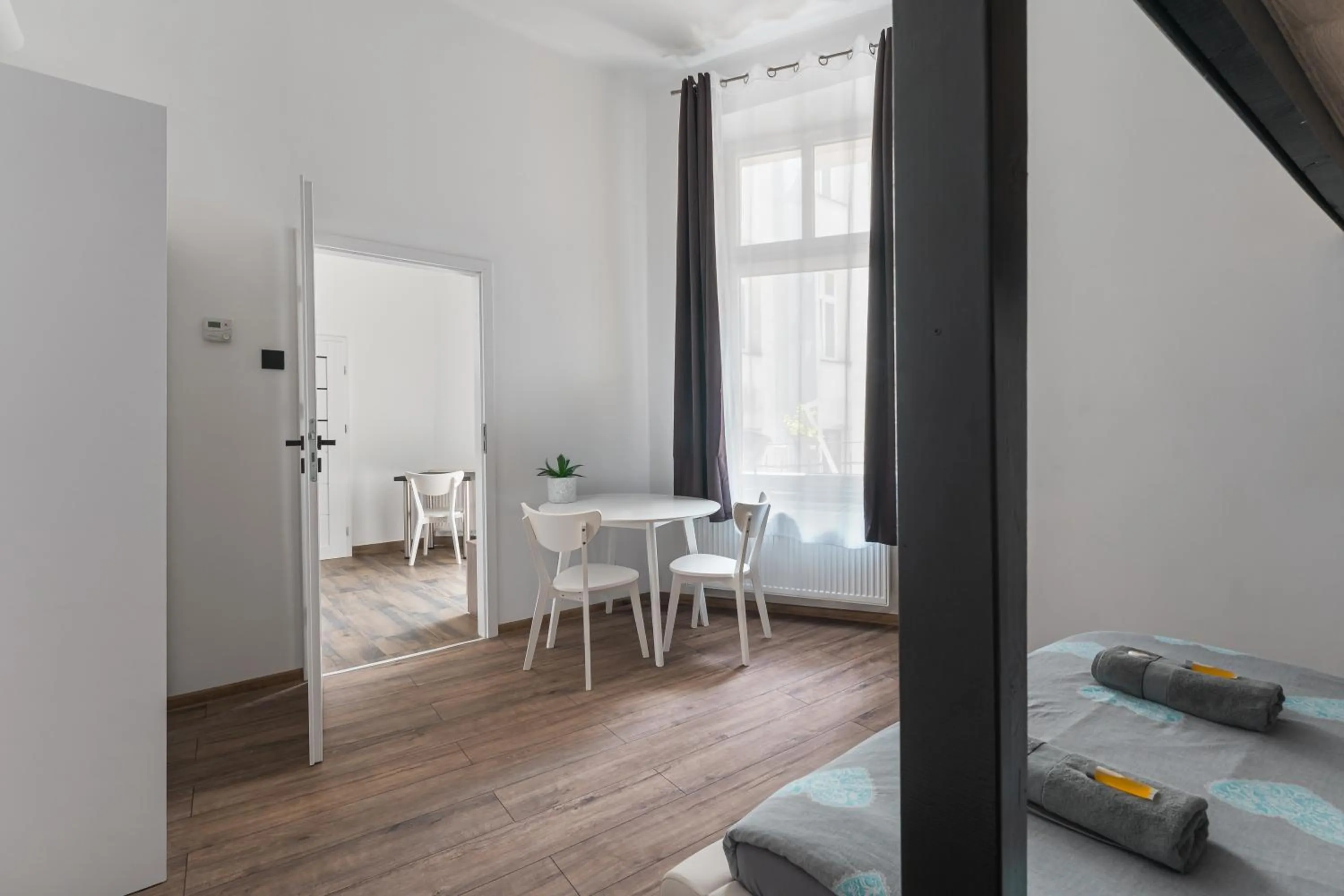 Bed in Queen Apartments