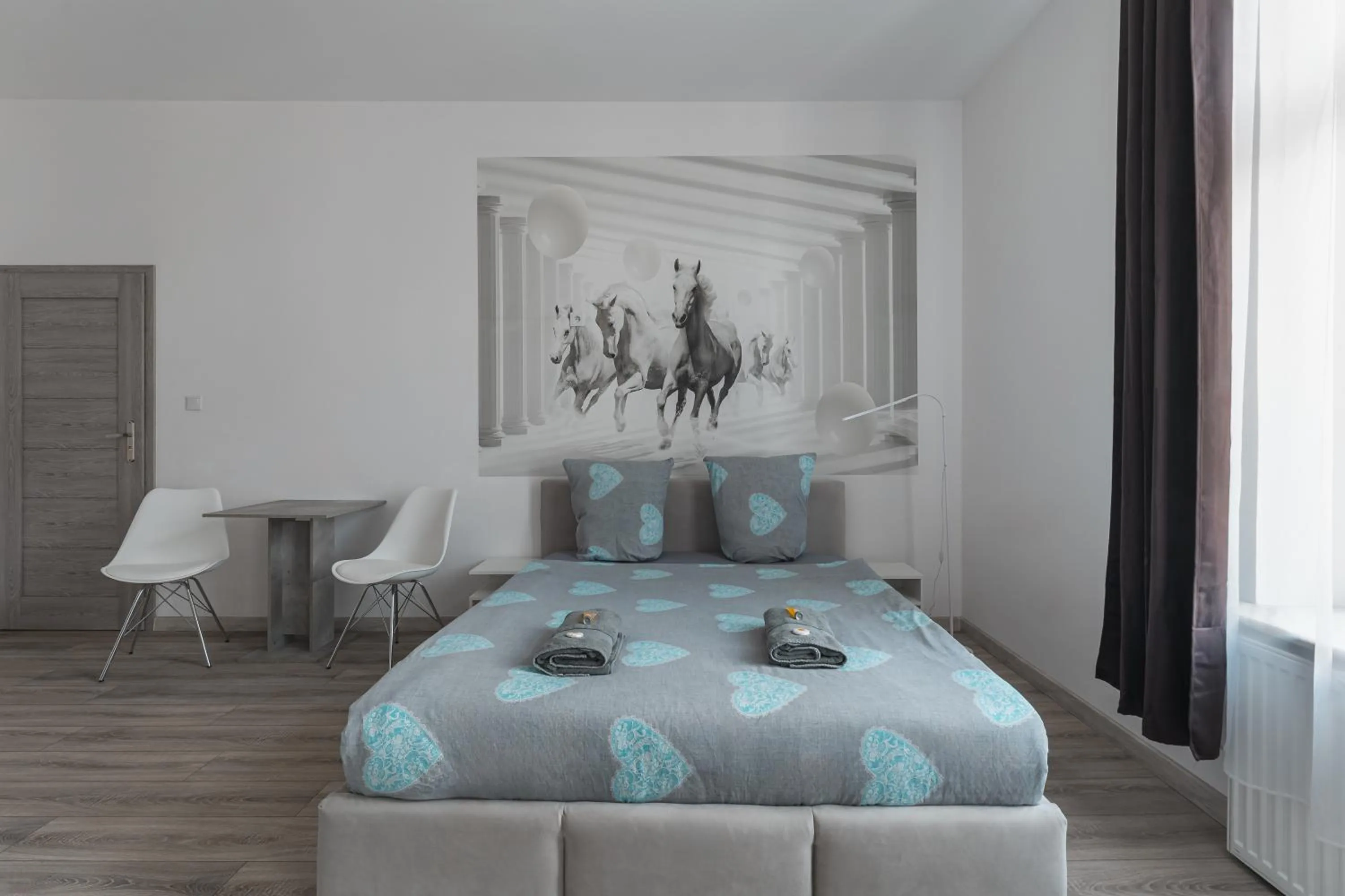 Bed in Queen Apartments