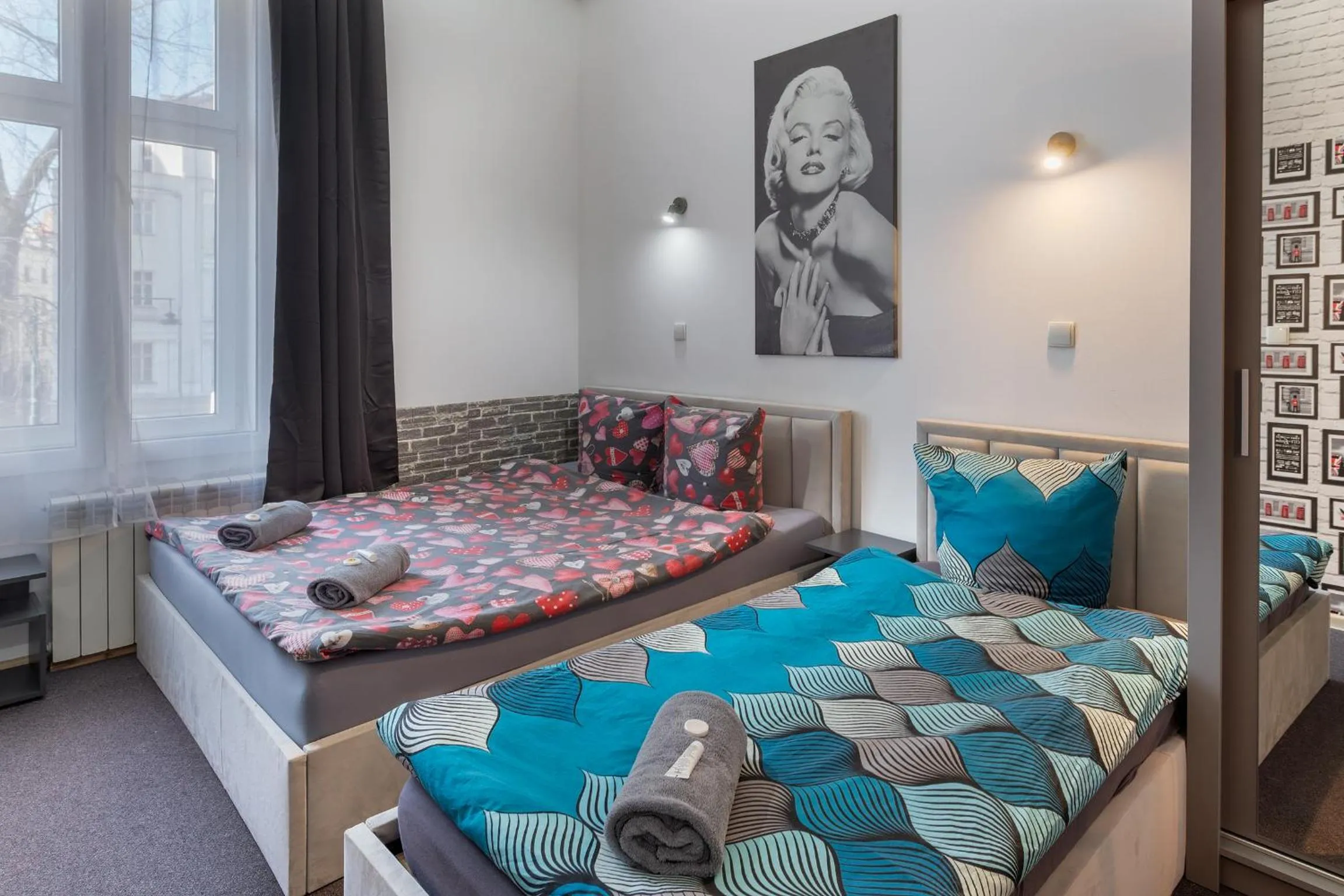 Bed in Queen Apartments