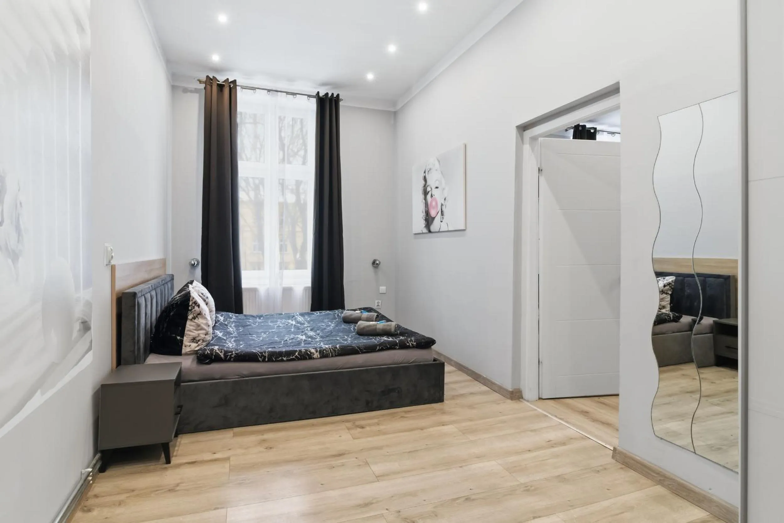 Bed in Queen Apartments