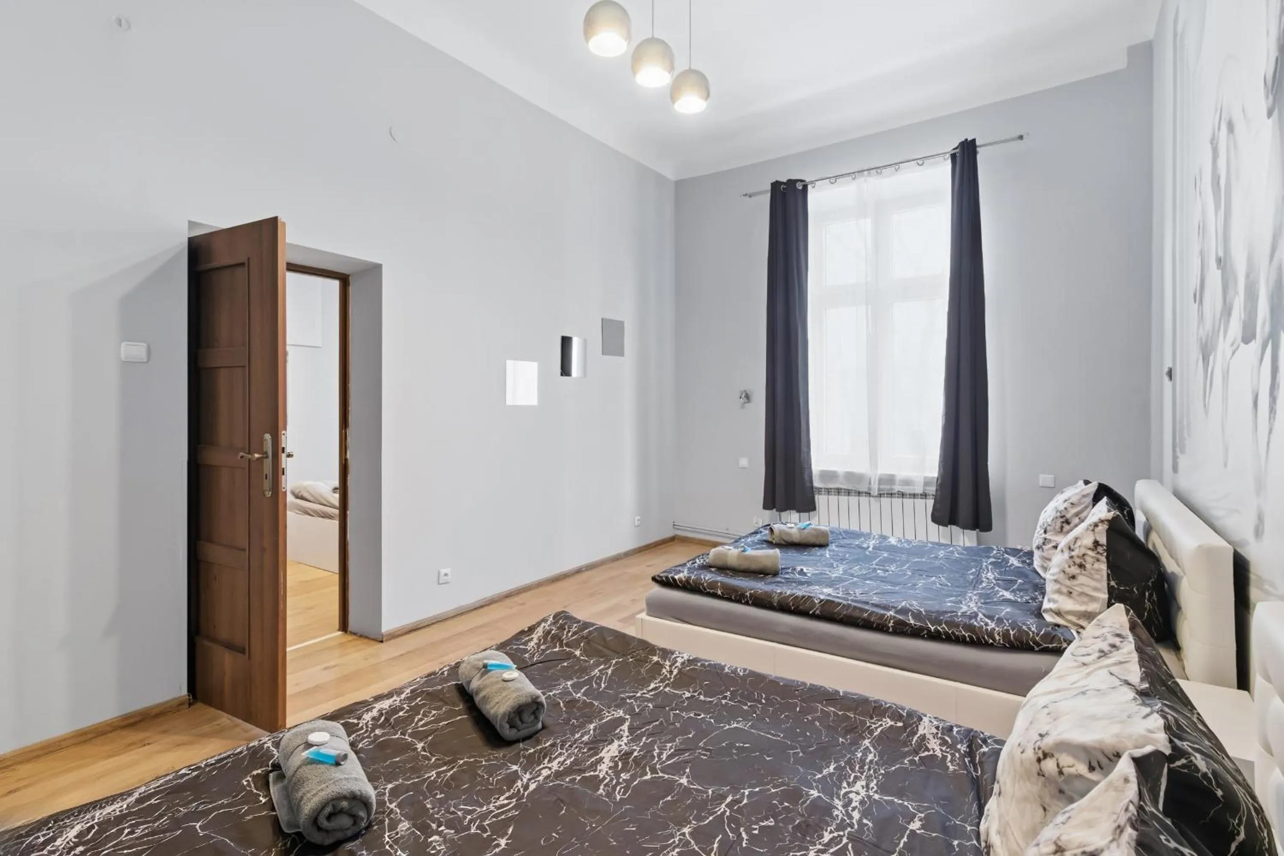 Bed in Queen Apartments