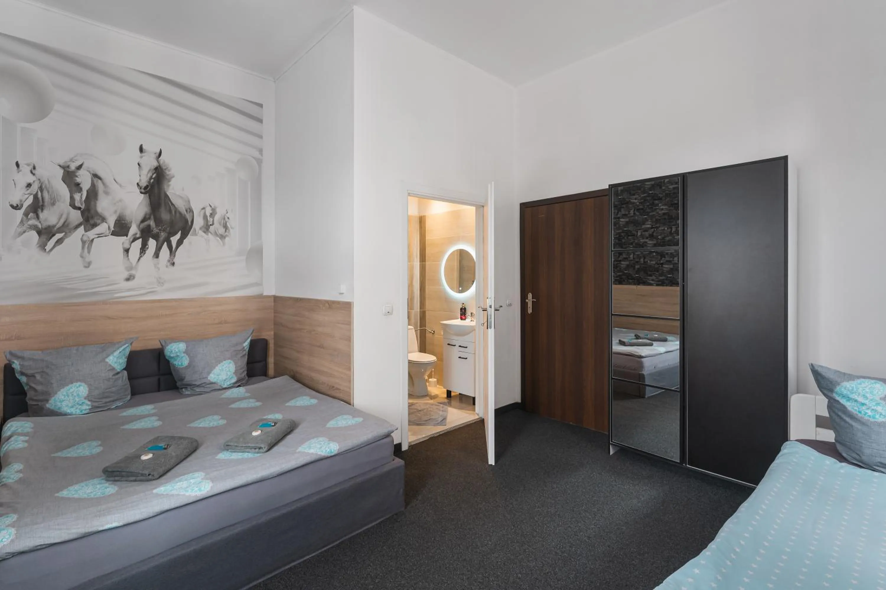 Bed in Queen Apartments