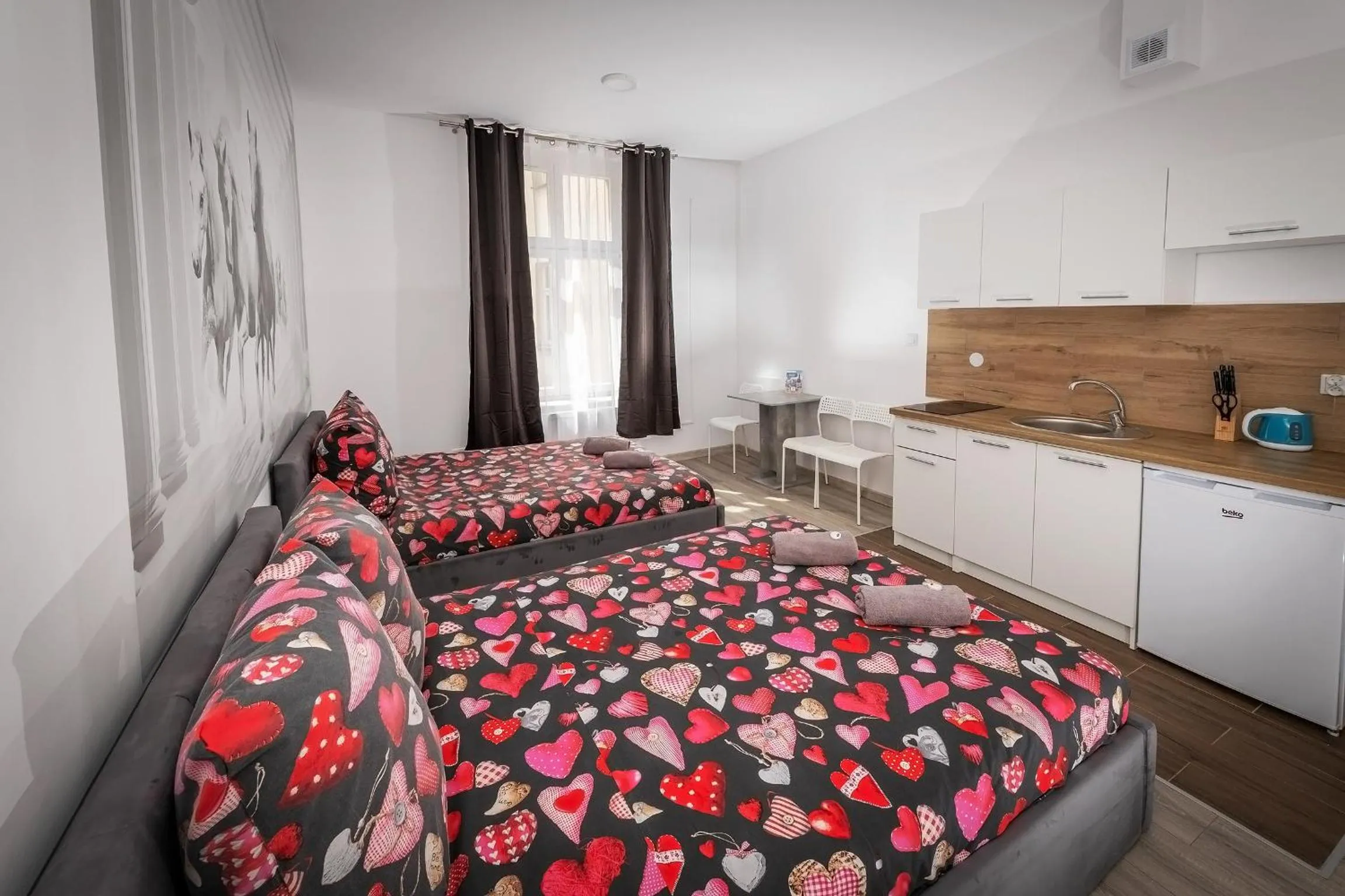 Bed in Queen Apartments