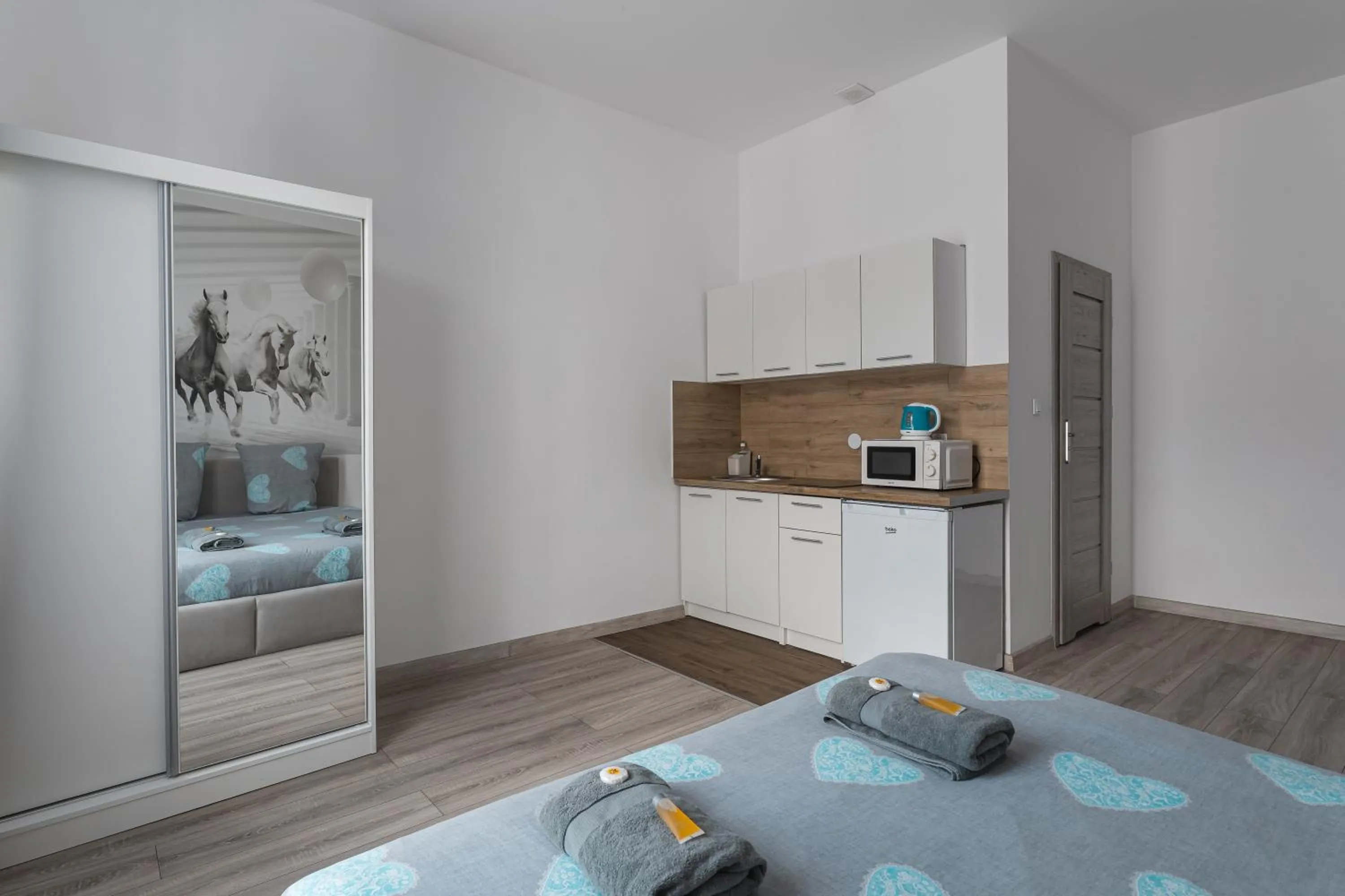 Kitchen or kitchenette, Bed in Queen Apartments