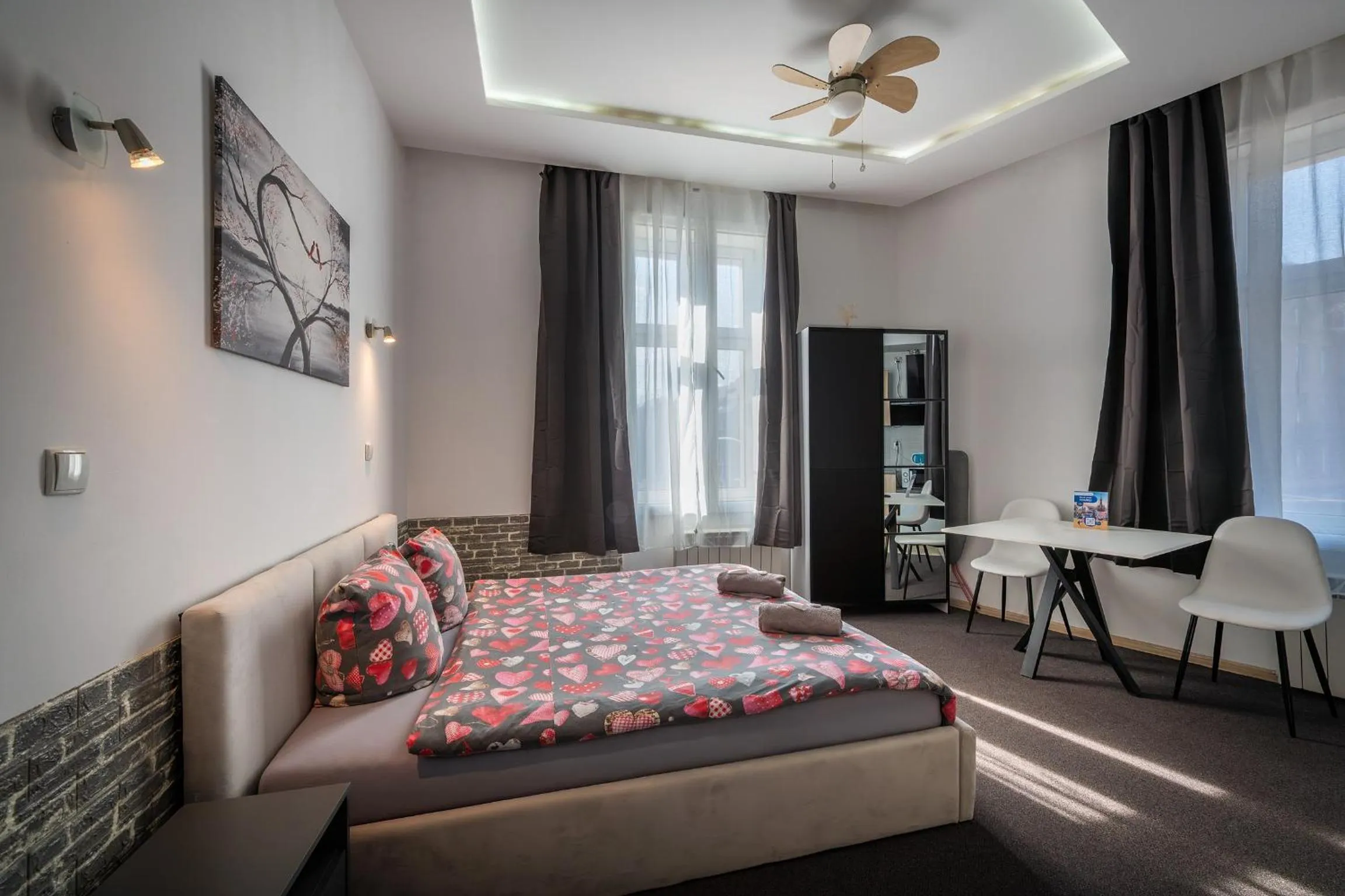 Bed in Queen Apartments