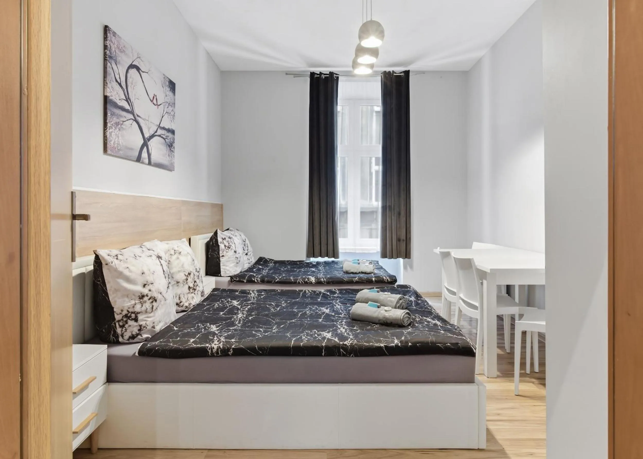 Bed in Queen Apartments