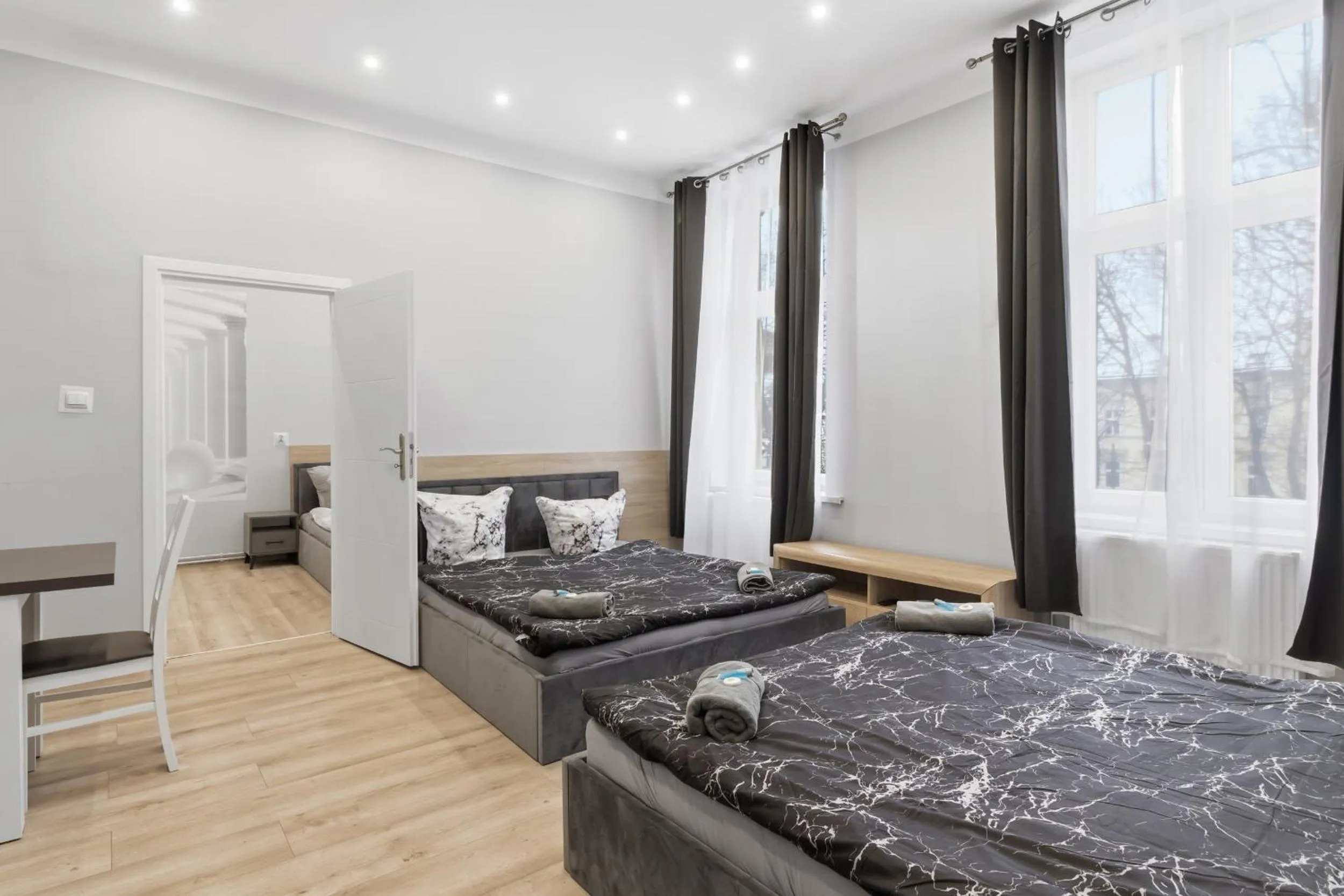 Bed in Queen Apartments