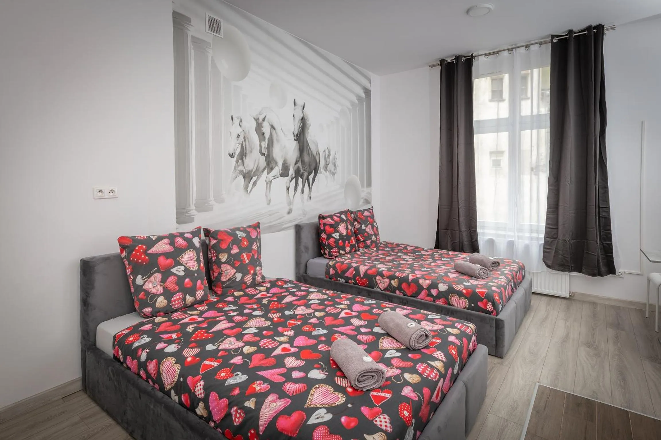 Bed in Queen Apartments