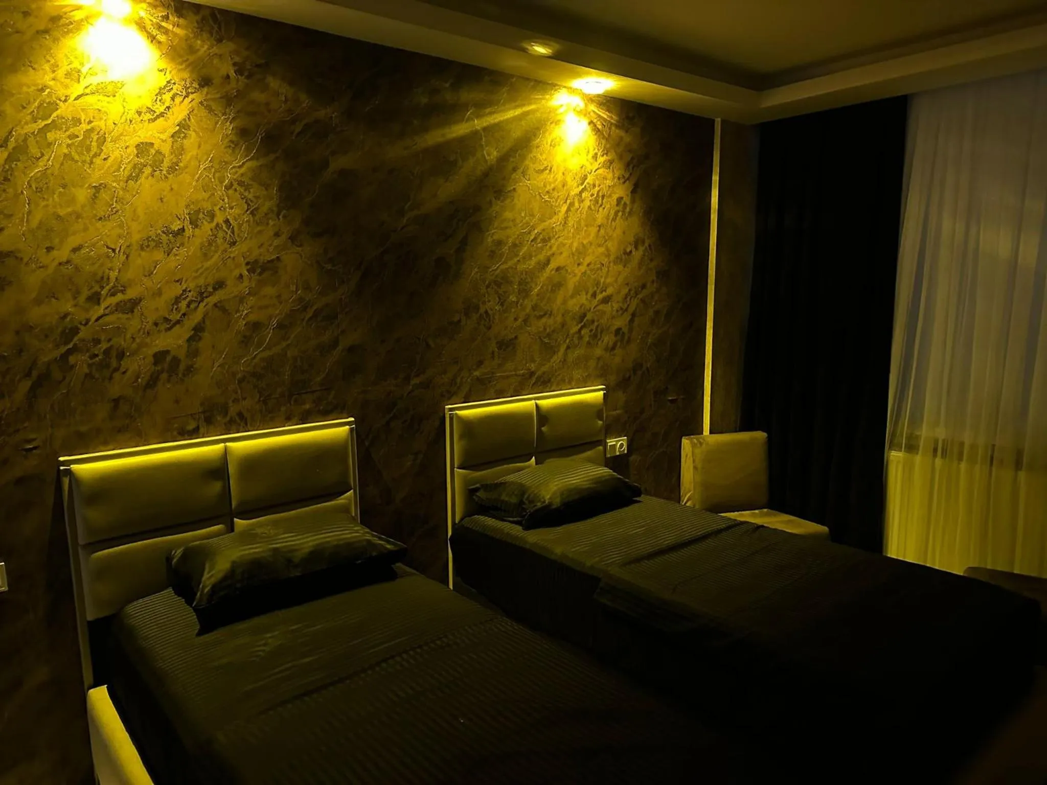 Bed in ÇANKAYA SUIT HOTEL