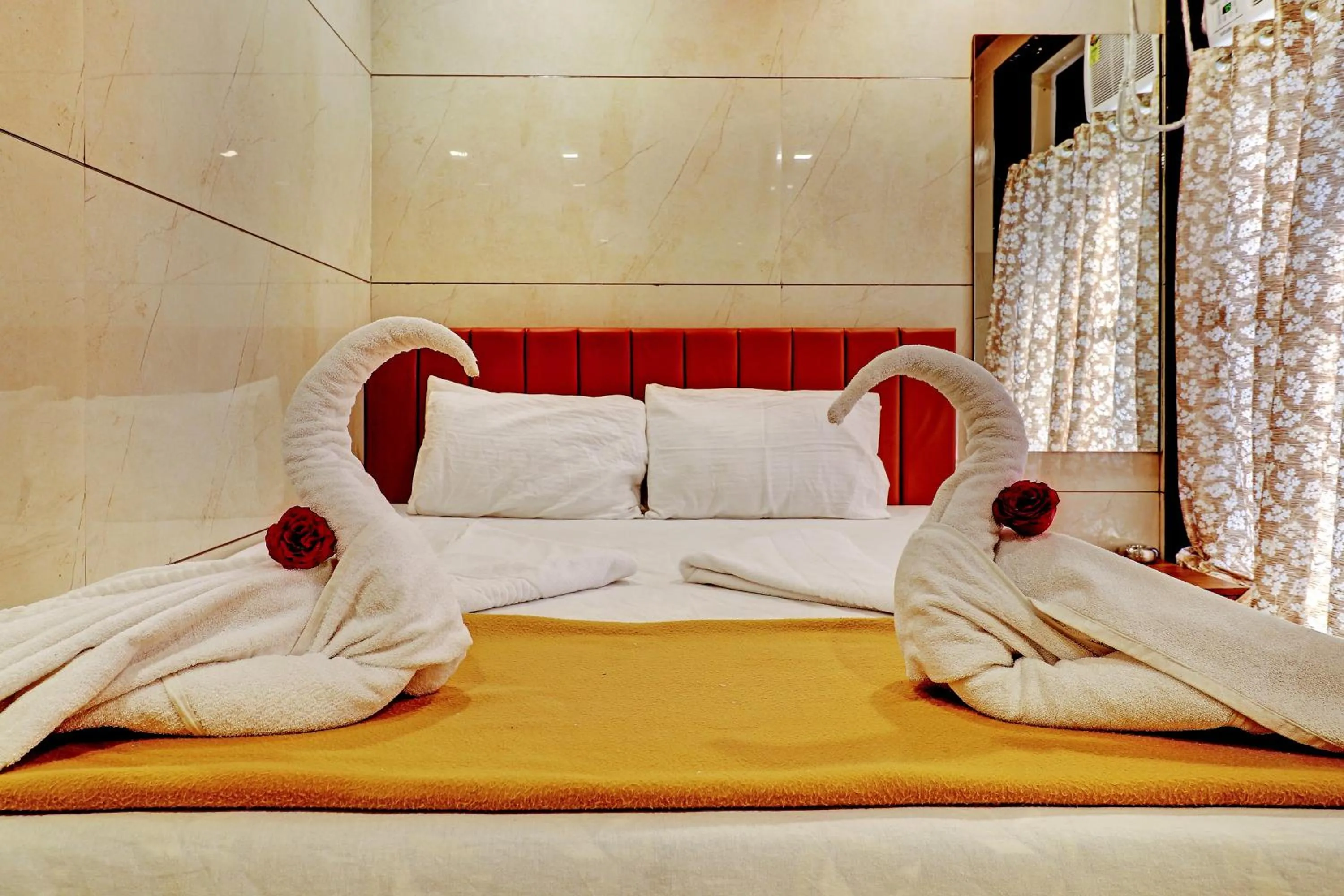 Bed in Prince NX Hotel