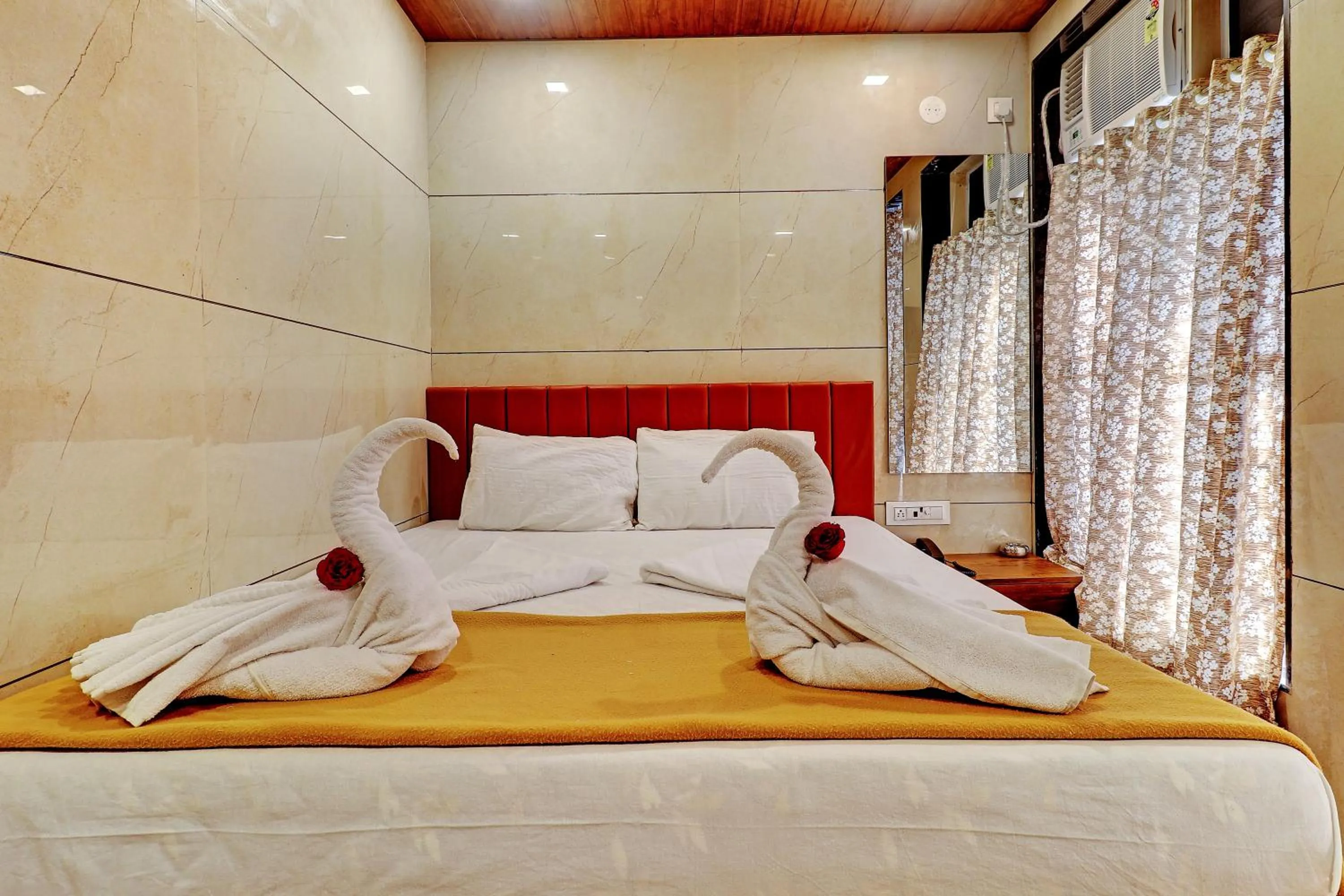 Bed in Prince NX Hotel