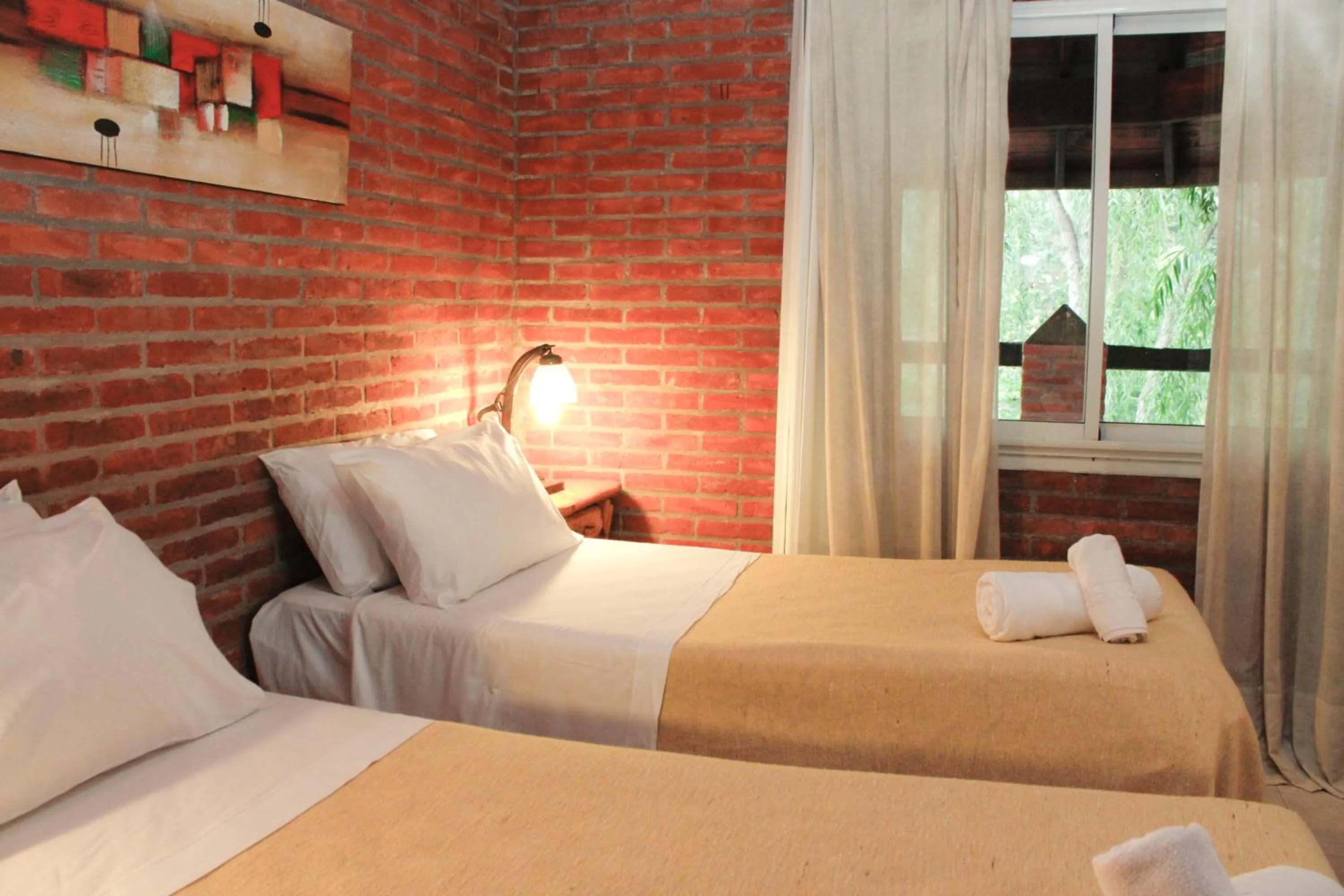 Bed in Carilo Village Apart Hotel & Spa