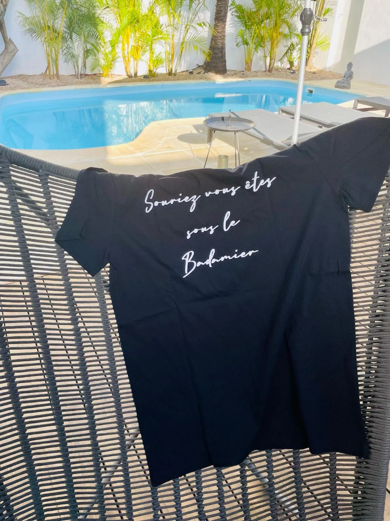 Swimming pool in Cosy Guest House Sous le Badamier