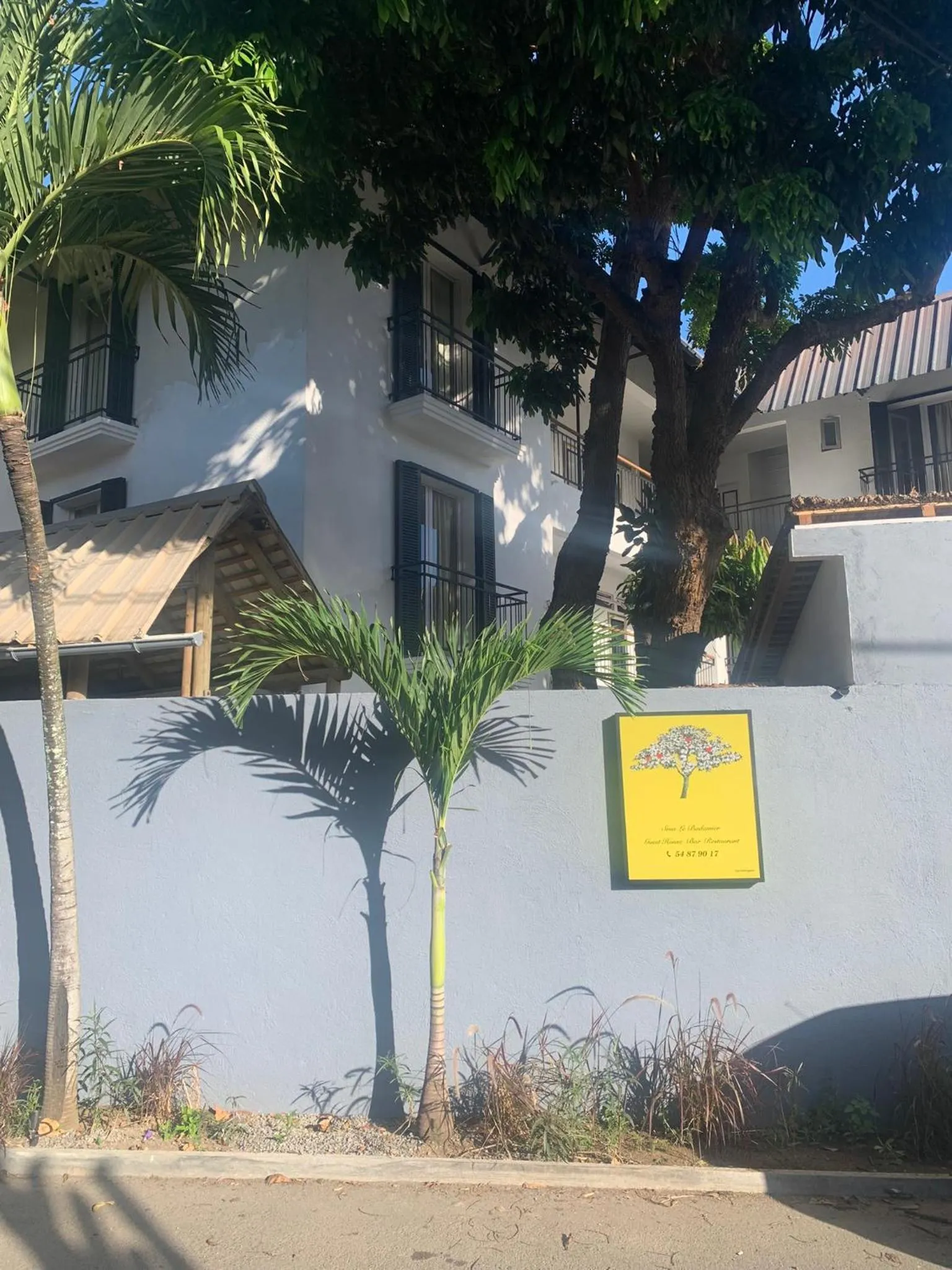 Property logo or sign in Cosy Guest House Sous le Badamier