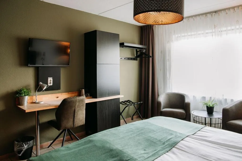 Living room, Bed in Hotel & Lodges Erve Bruggert