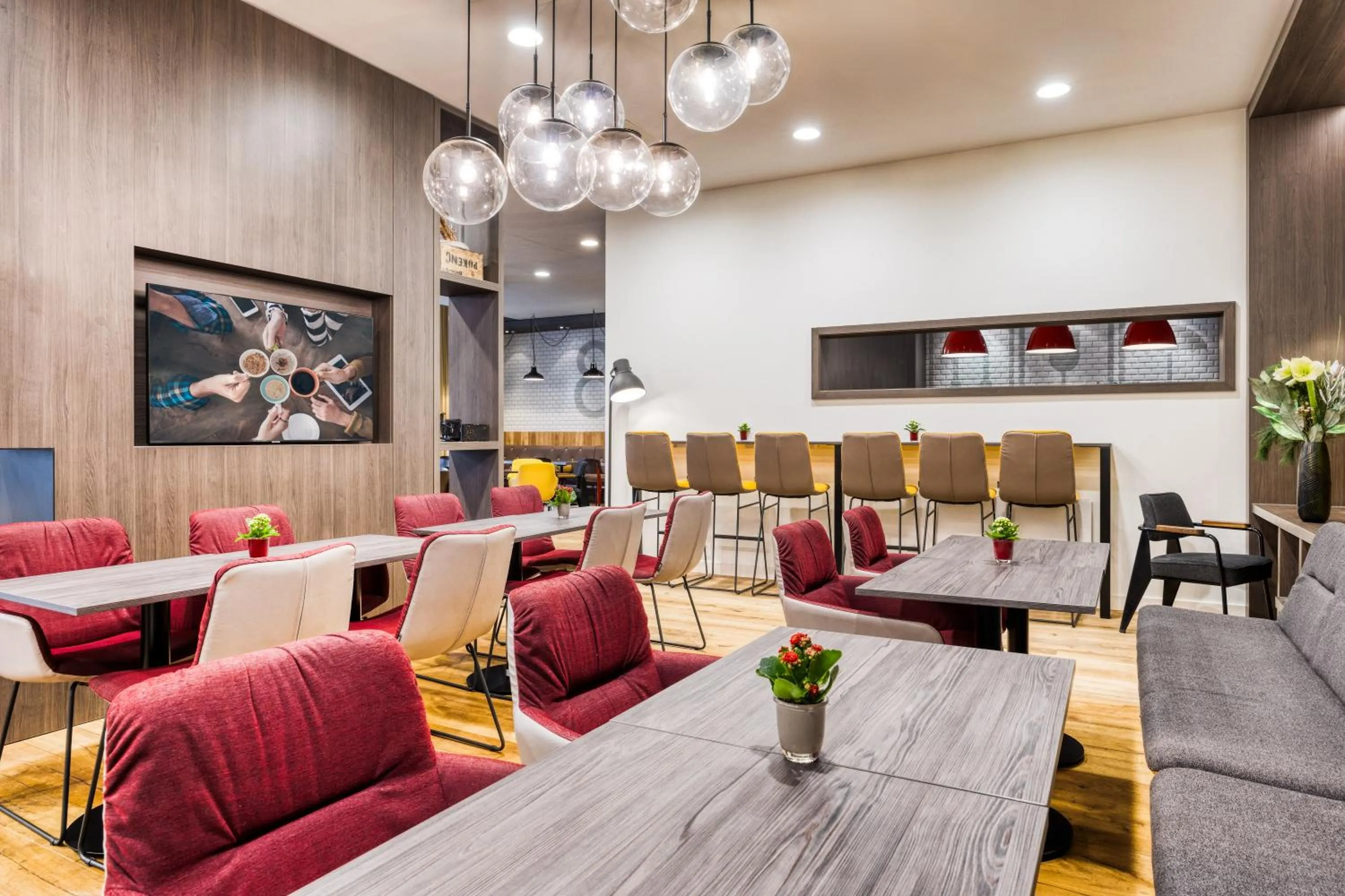 Communal lounge/ TV room in Citadines Michel Hamburg