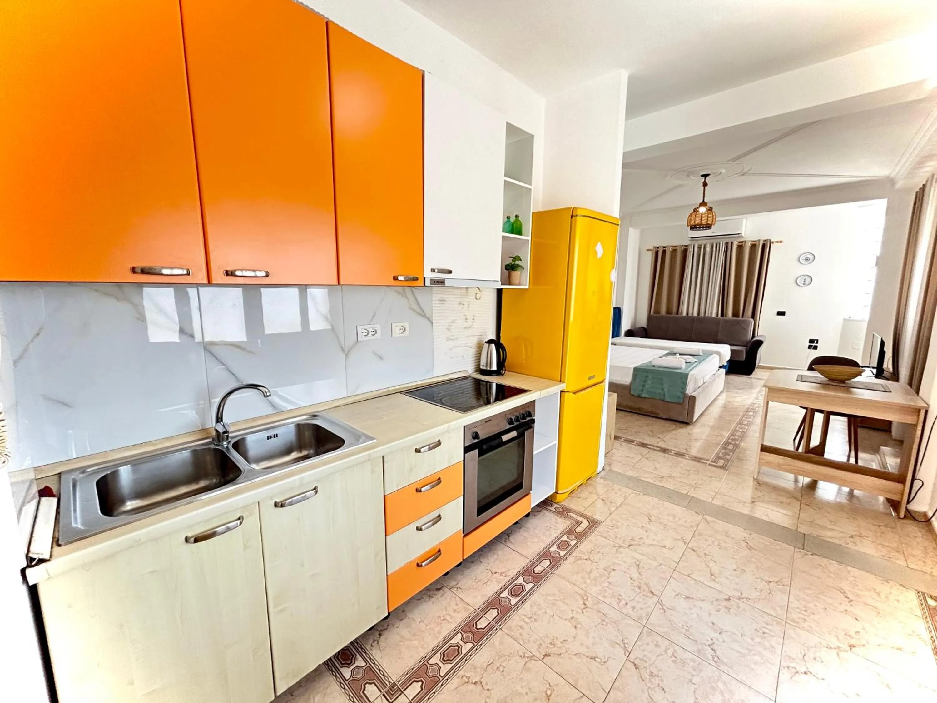 Kitchen or kitchenette in Budget Retreat Tirana & Studios