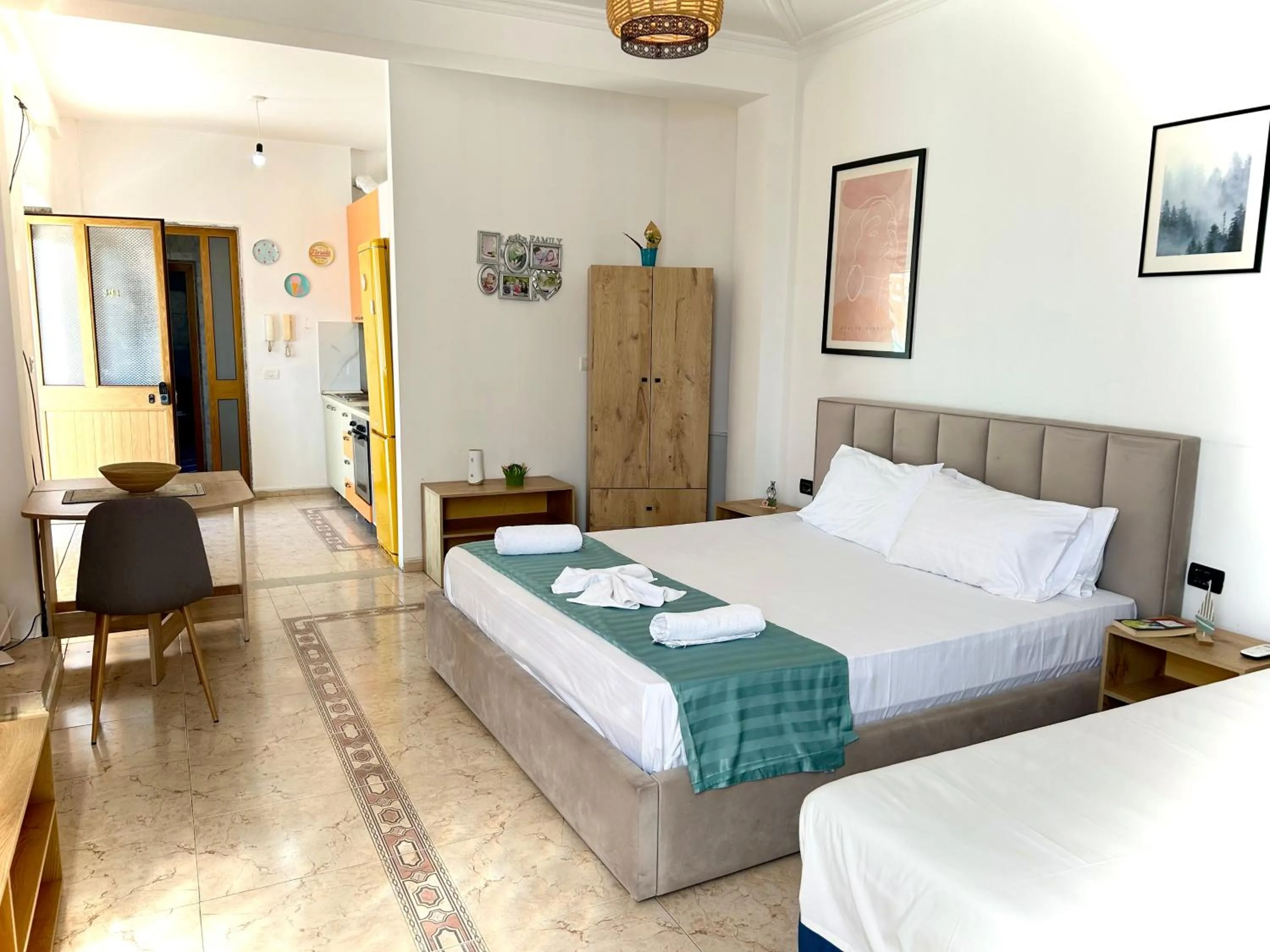 Living room, Bed in Budget Retreat Tirana & Studios