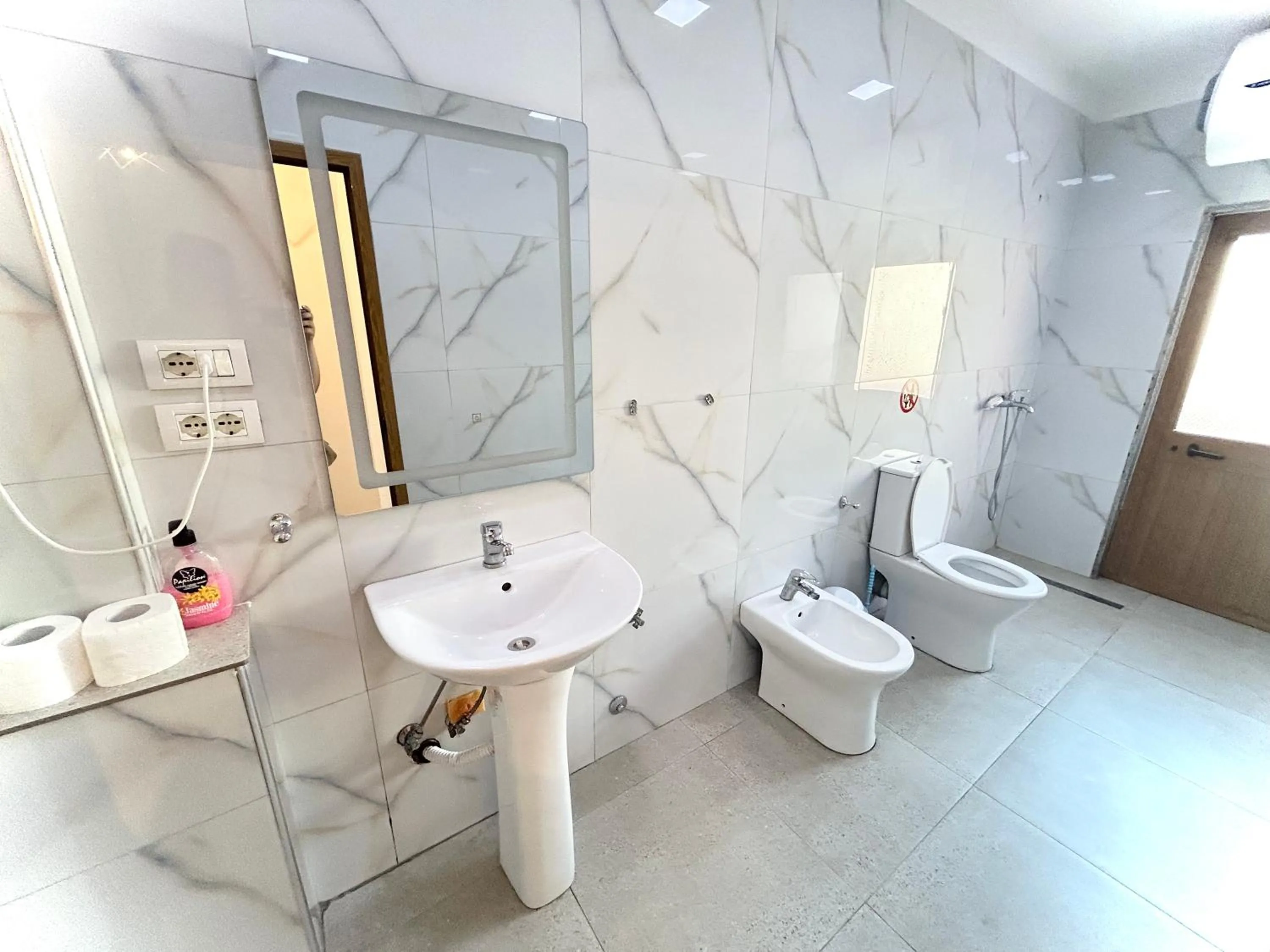 Shower in Budget Retreat Tirana & Studios