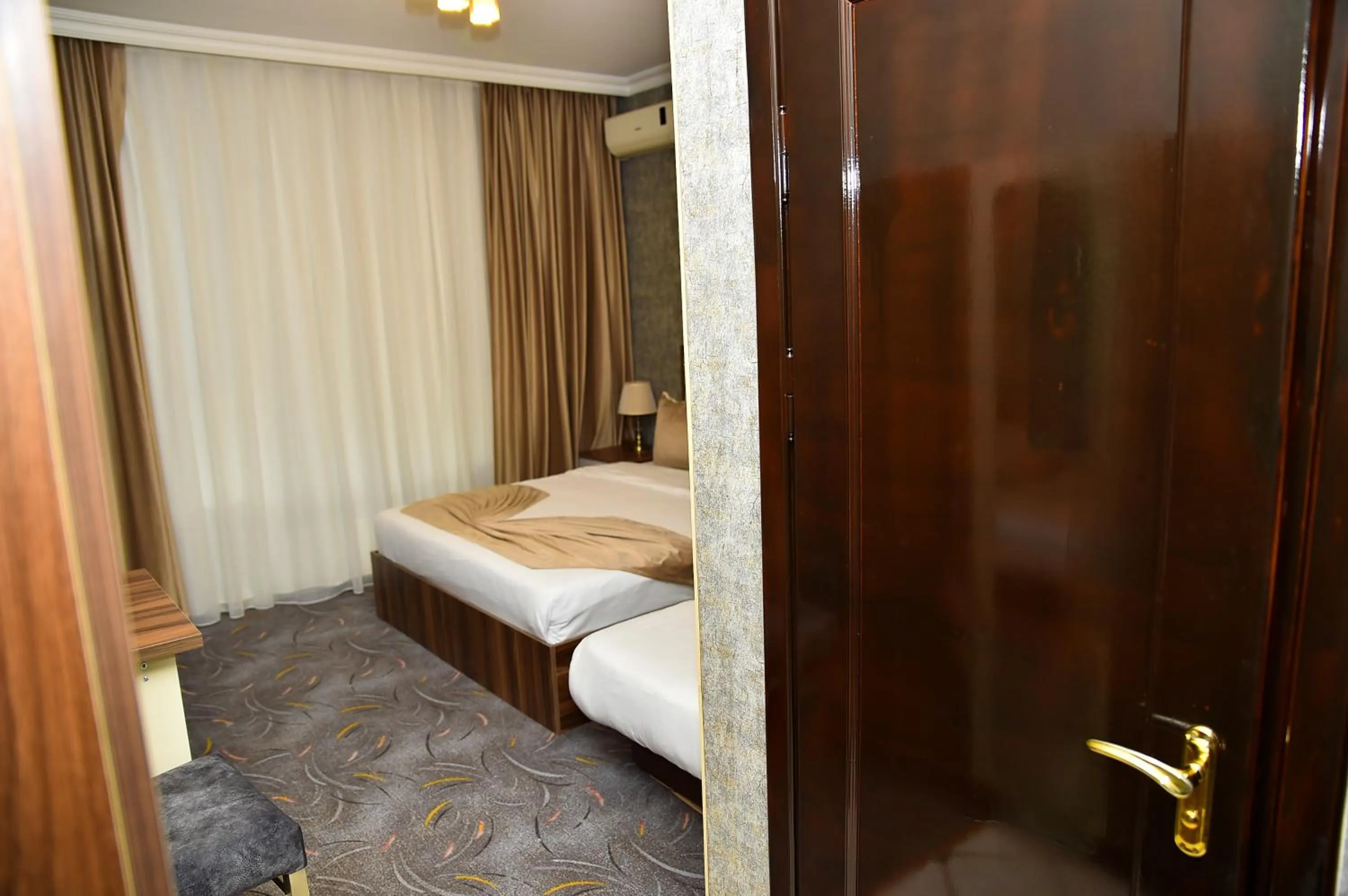 Bed in Boulevard Rigs Boutique Hotel