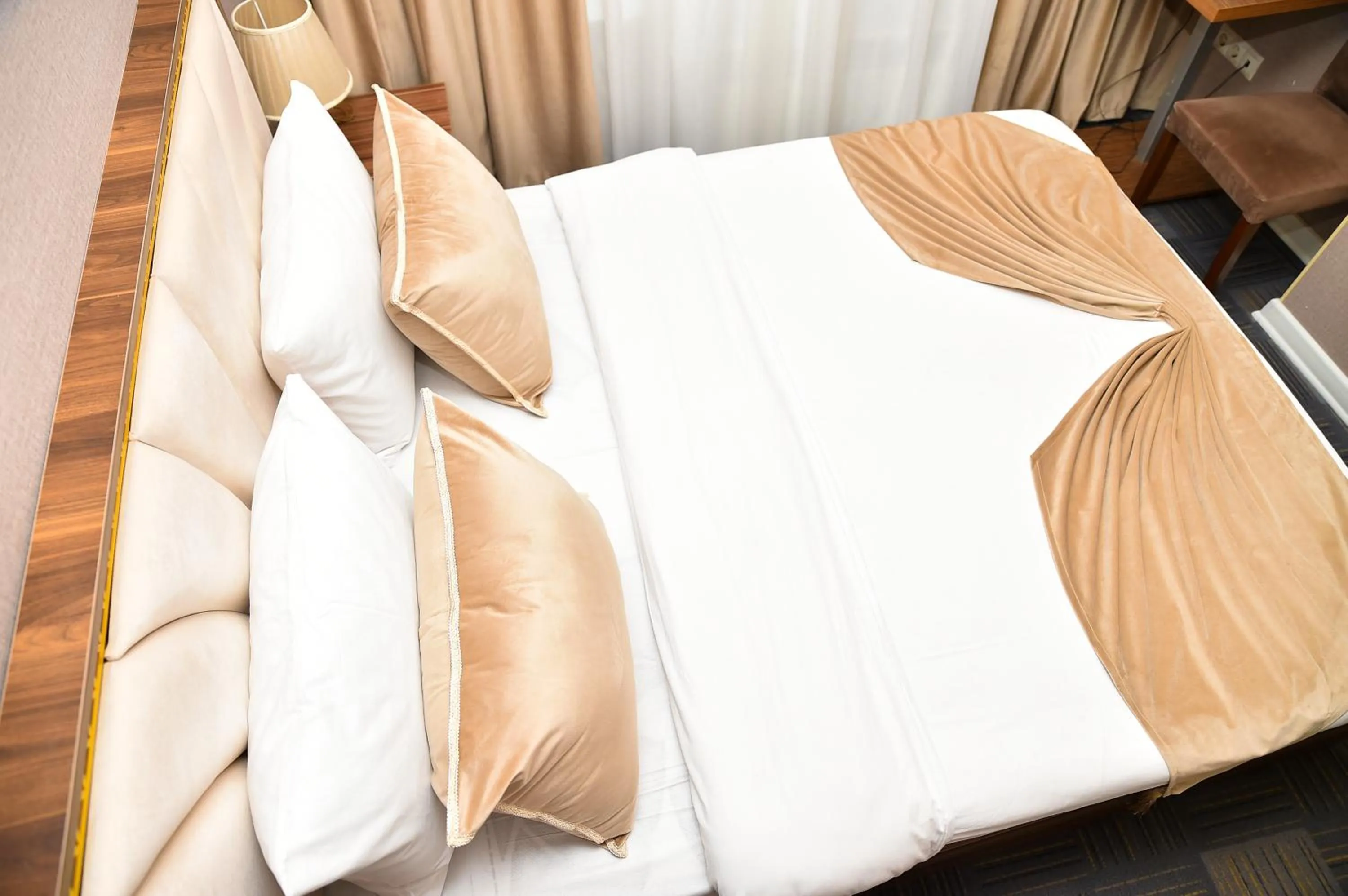 Bed in Boulevard Rigs Boutique Hotel