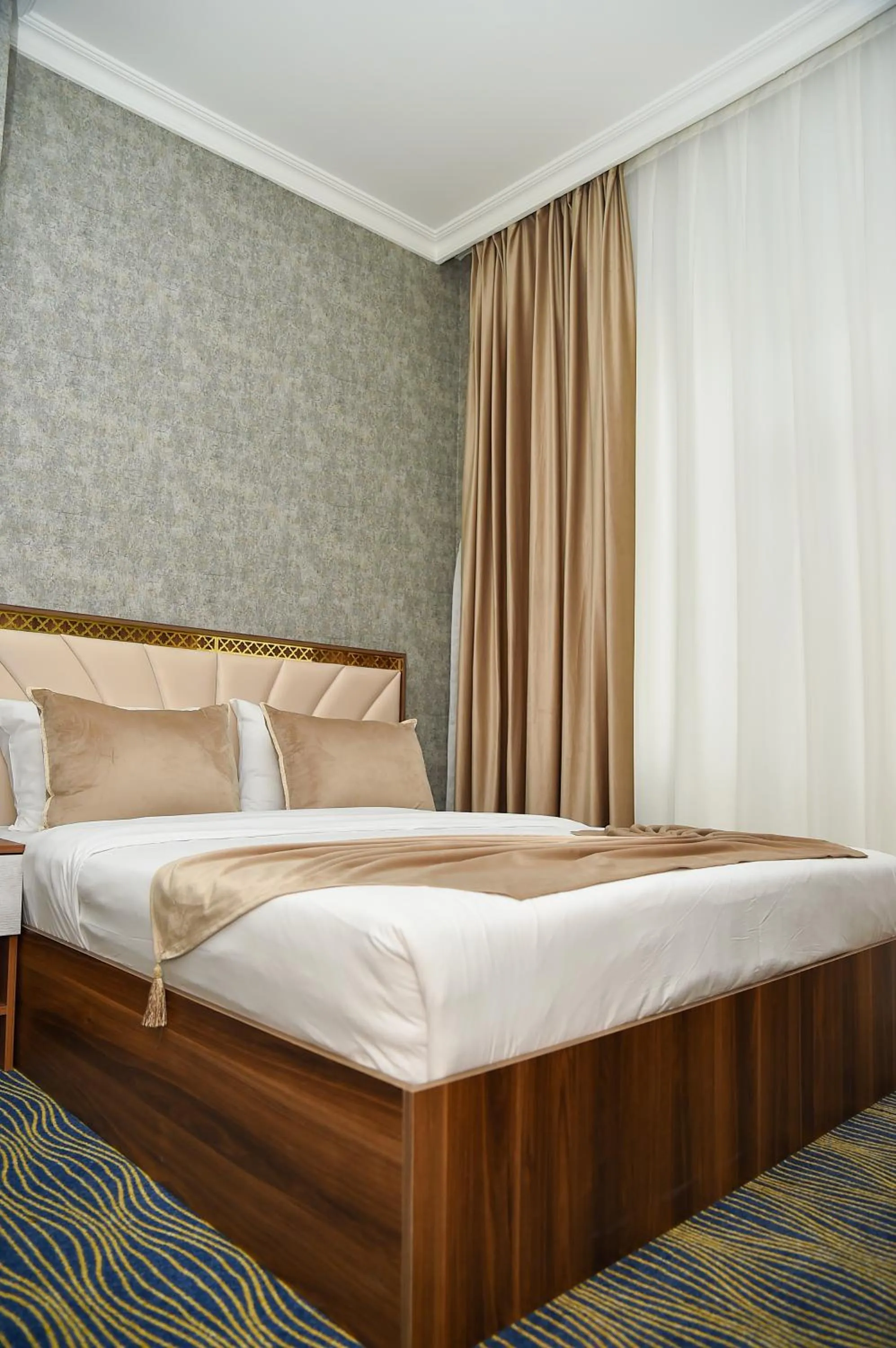 Bed in Boulevard Rigs Boutique Hotel