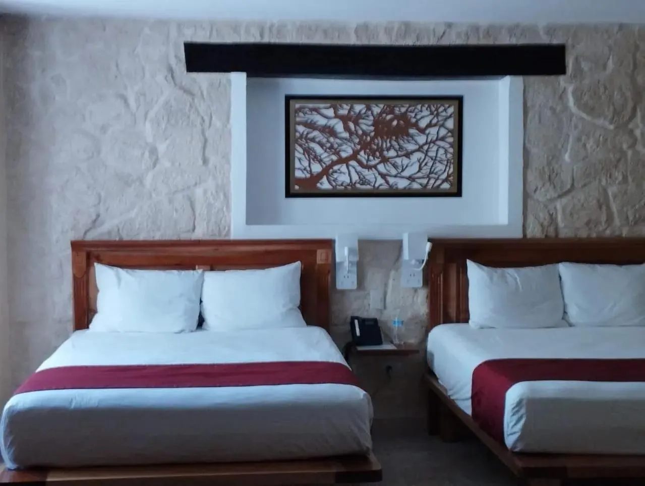 Bed in Cancun International Suites
