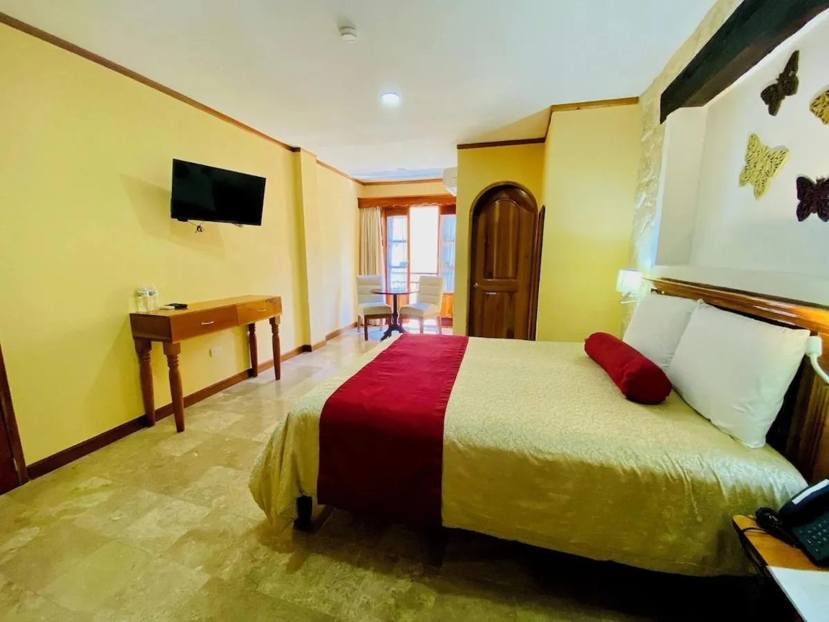 Bed in Cancun International Suites