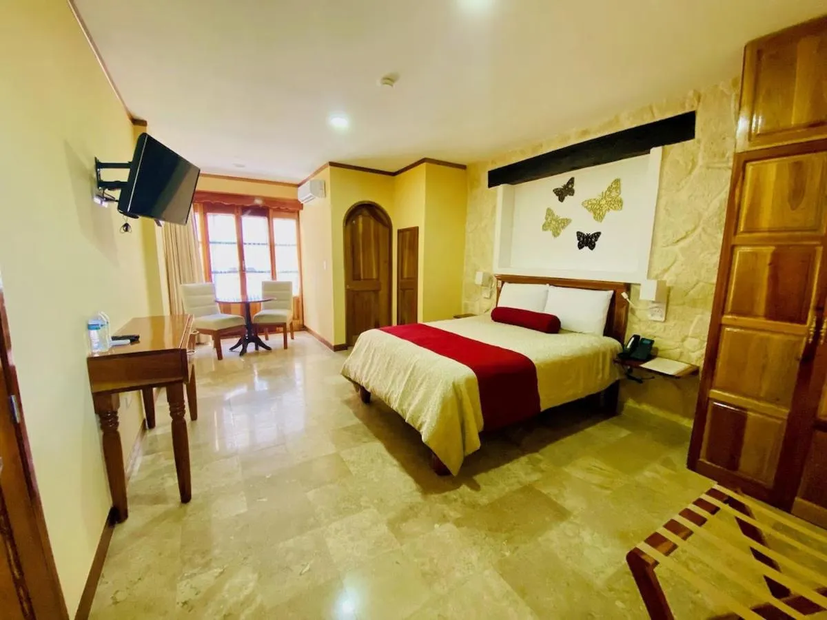 Bed in Cancun International Suites